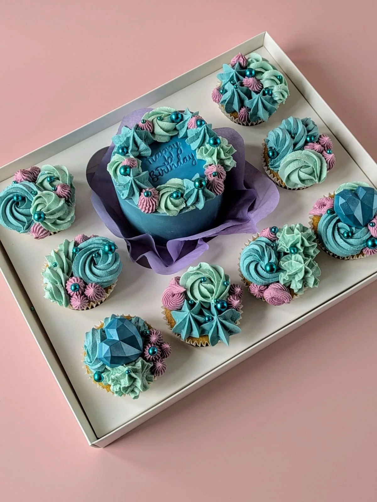 Large blue ocean themed vegan birthday bento with 8 cupcakes from Bristol