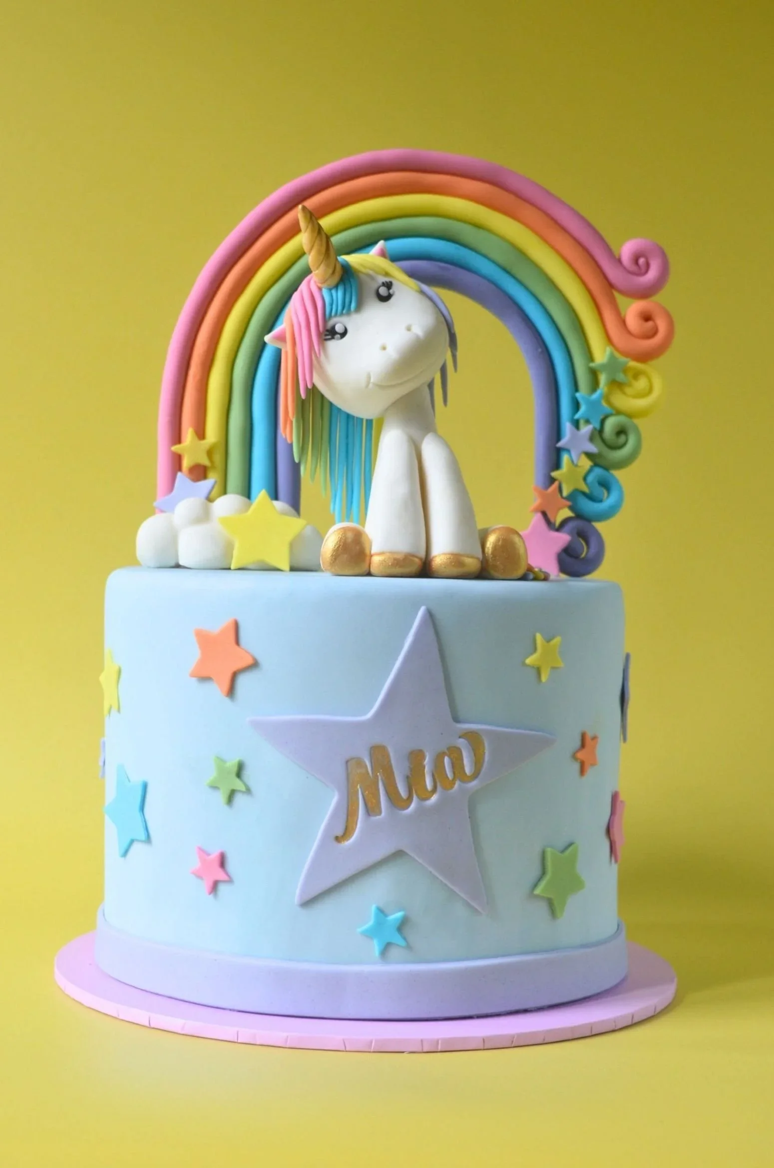 Unicorn rainbow birthday cake with handmade sugar topper from vegan cake shop in Bristol