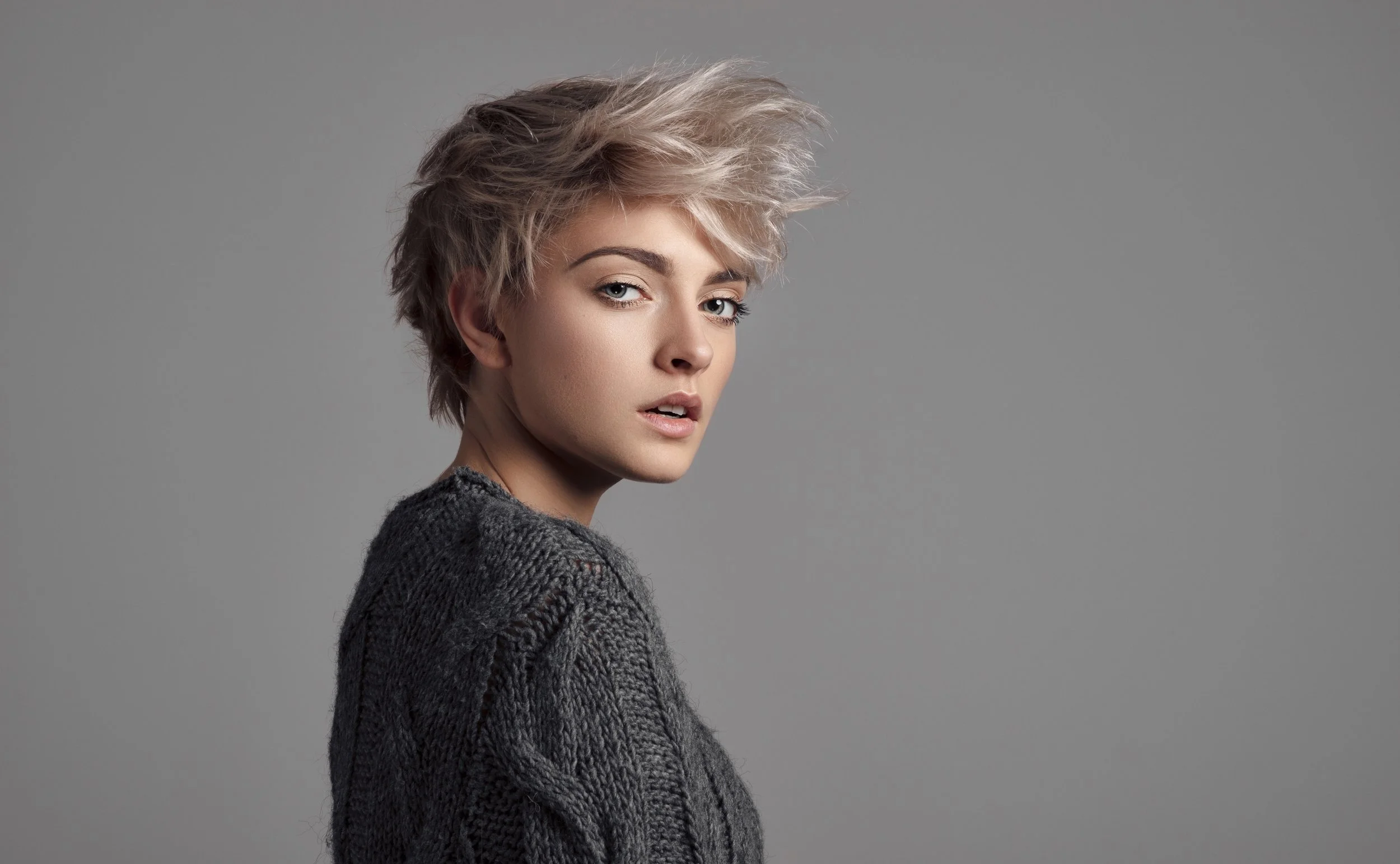 Fashion-portrait-of-female-model-with-blond-short-hair-wear-sweater-1080398770_4019x2482.jpeg