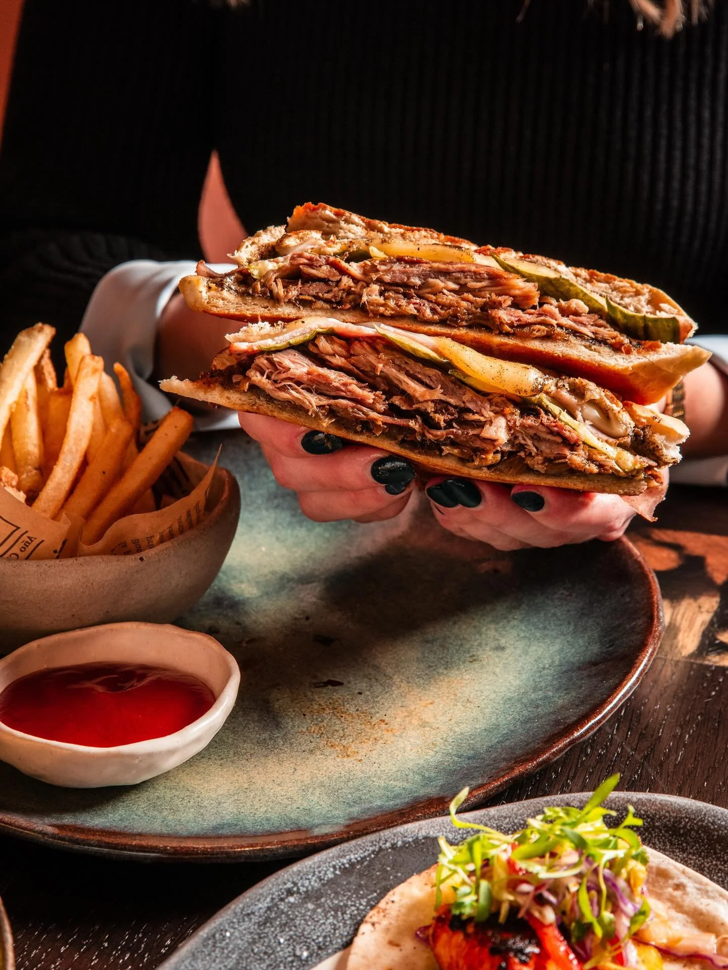 Power moves need power lunches.

Meet the Cubano: slow-roasted pork, Swiss, charred habanero mustard and pickles between crisp French bread.
