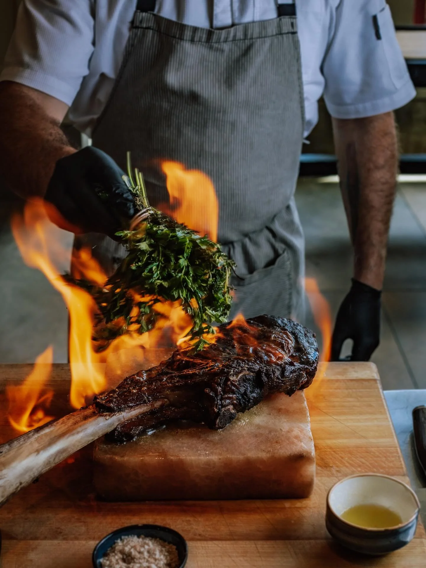 Fire, flavor, and a moment worth gathering for. 🔥🥩

Our 36 oz Prime Tomahawk takes center stage with a mezcal flamb&eacute; and finished with rich bone marrow butter for a bold, unforgettable bite.