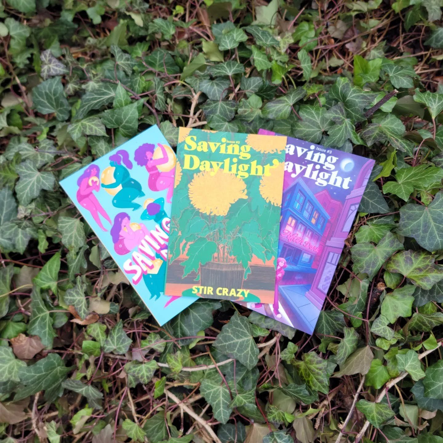 Three colorful magazines