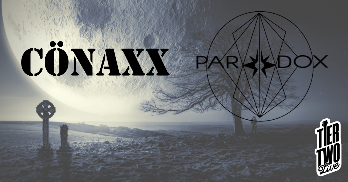 A large moon in the night sky over a landscape with leafless trees, a grave, and tombstones, with overlayed text and symbols including 'CONAXX,' 'PARADOX,' and a geometric design.