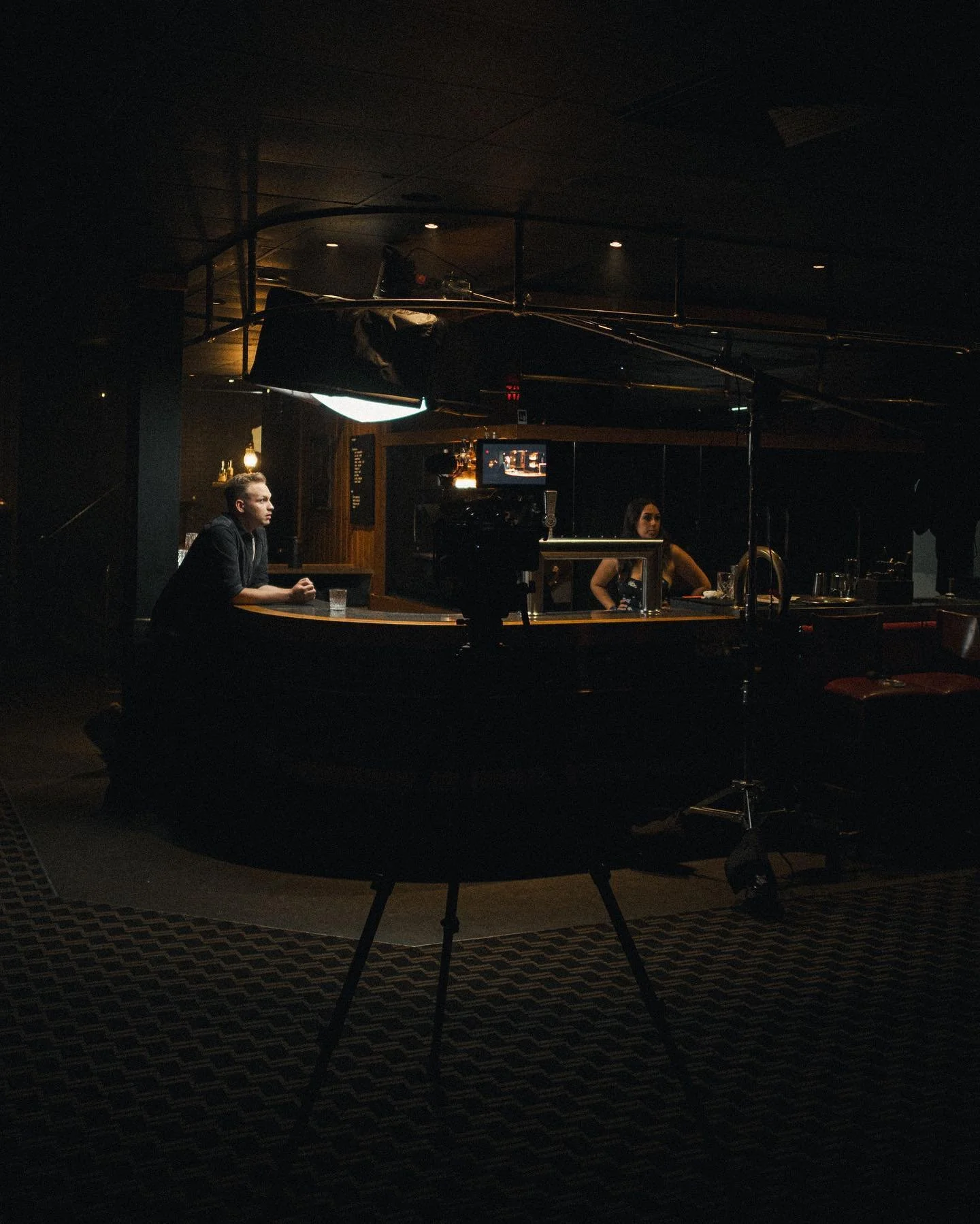 Bar Scene Breakdown | We paired the @kupogrip Low Mighty with a Junior Boom holding up the @aputure.lighting 600D diffused through @chimeralighting full diffusion Pancake with skirting to shape the light as needed. Throughout the scene overhead pract