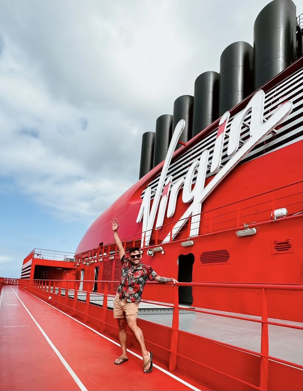 Derek Gebelhardt, Virgin Voyages Top 100 First Mate, on the deck of a Virgin Voyages ship