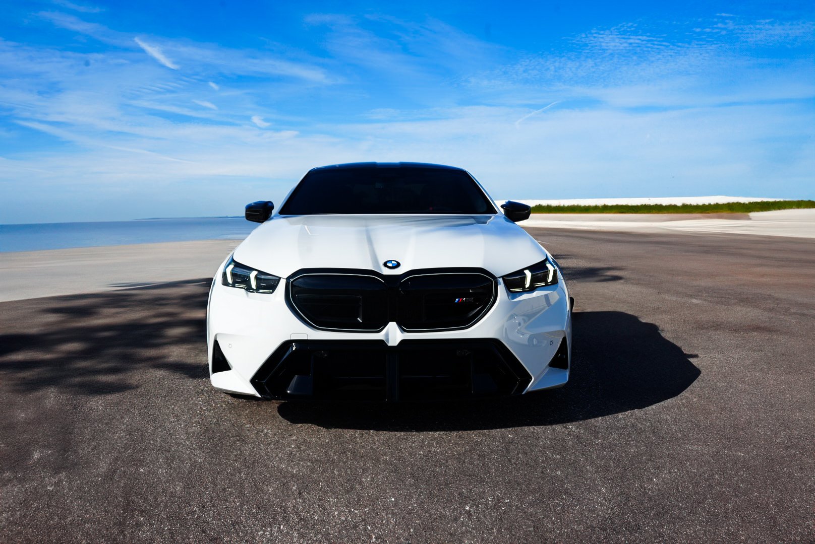 White 2026 BMW M5  along Courtney Campbell Causeway, Tampa FL.