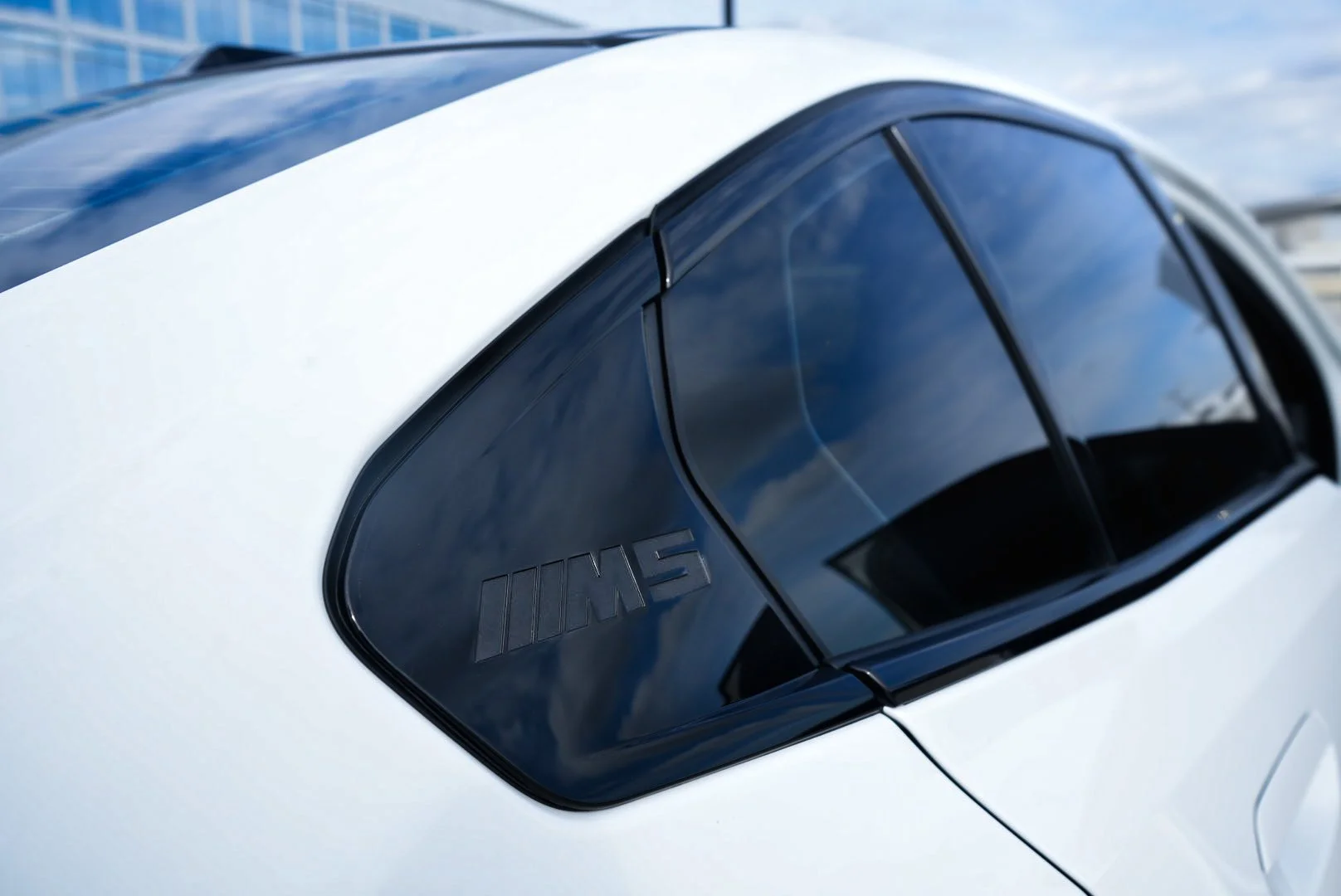 White 2026 BMW M5  along Courtney Campbell Causeway, Tampa FL.