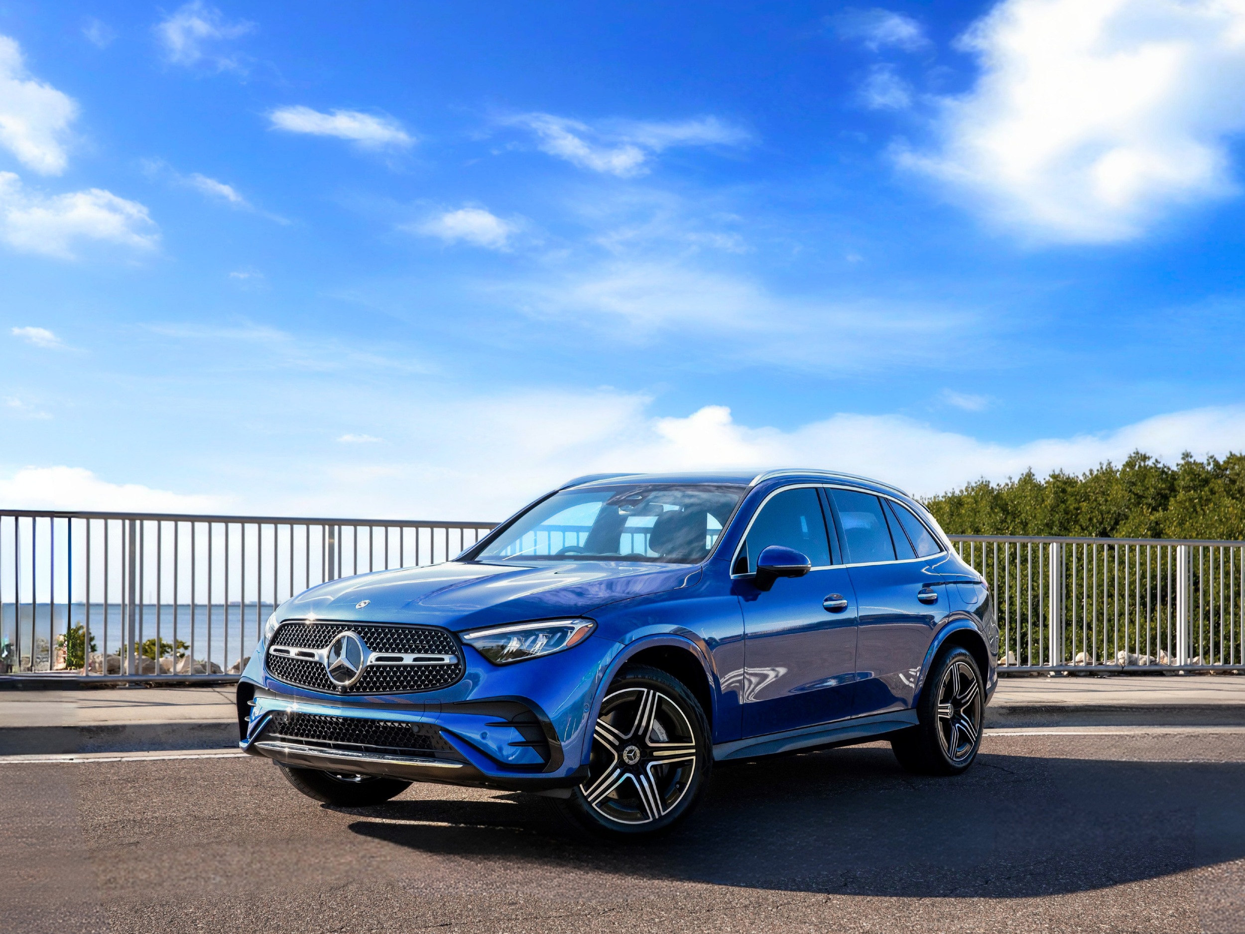 Blue 2023 Mercedes GLC along Courtney Campbell Causeway, Tampa FL.
