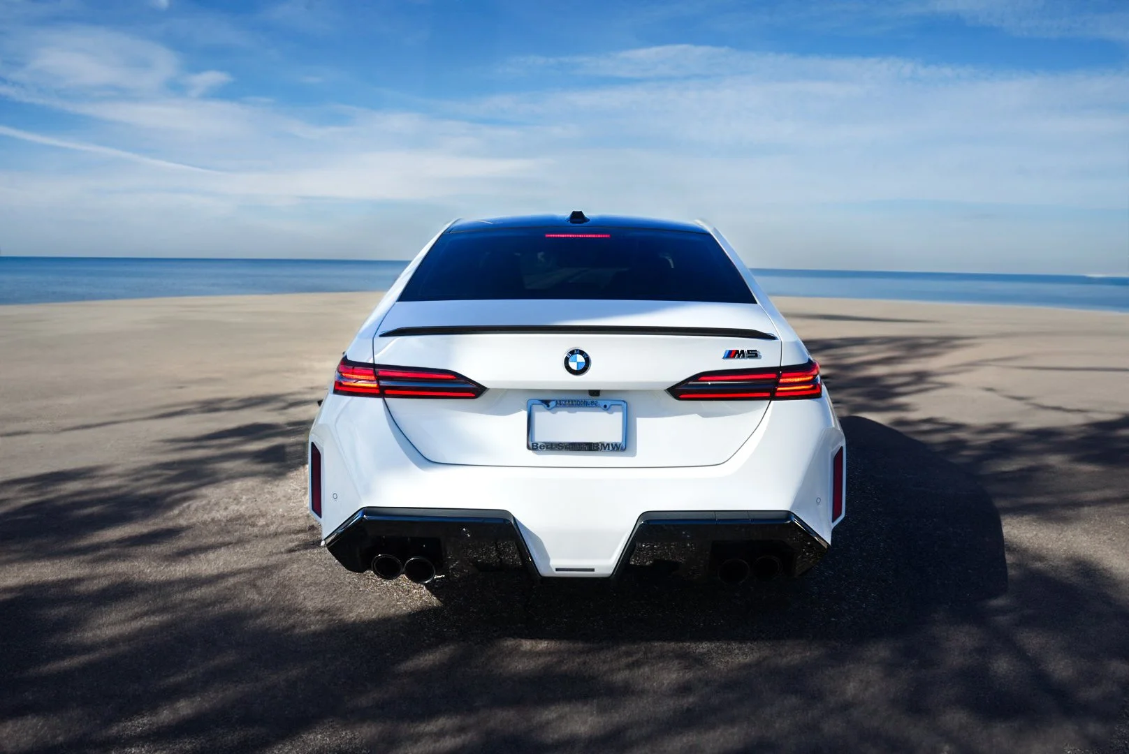 White 2026 BMW M5  along Courtney Campbell Causeway, Tampa FL.