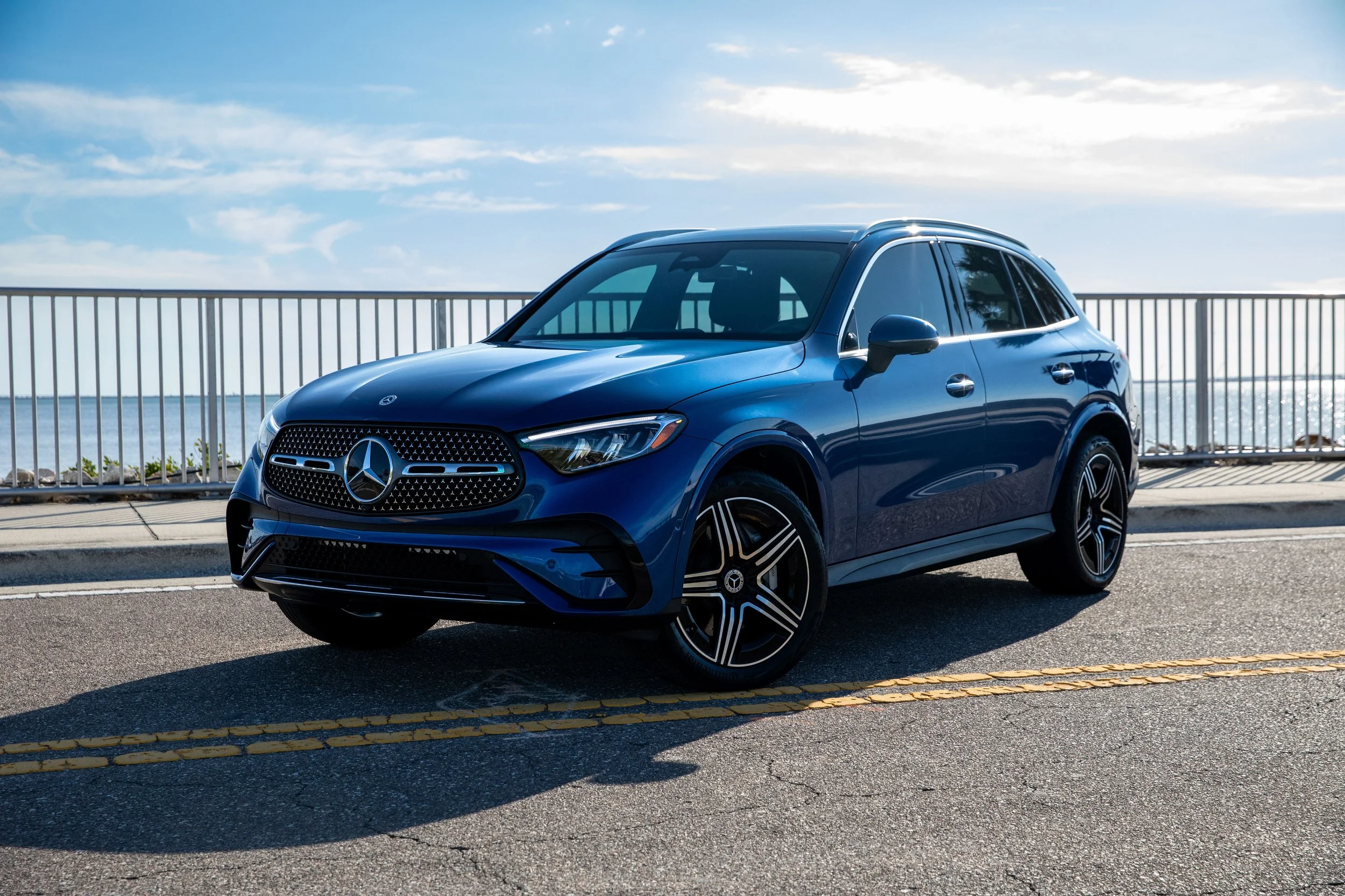 Blue 2023 Mercedes GLC along Courtney Campbell Causeway, Tampa FL.