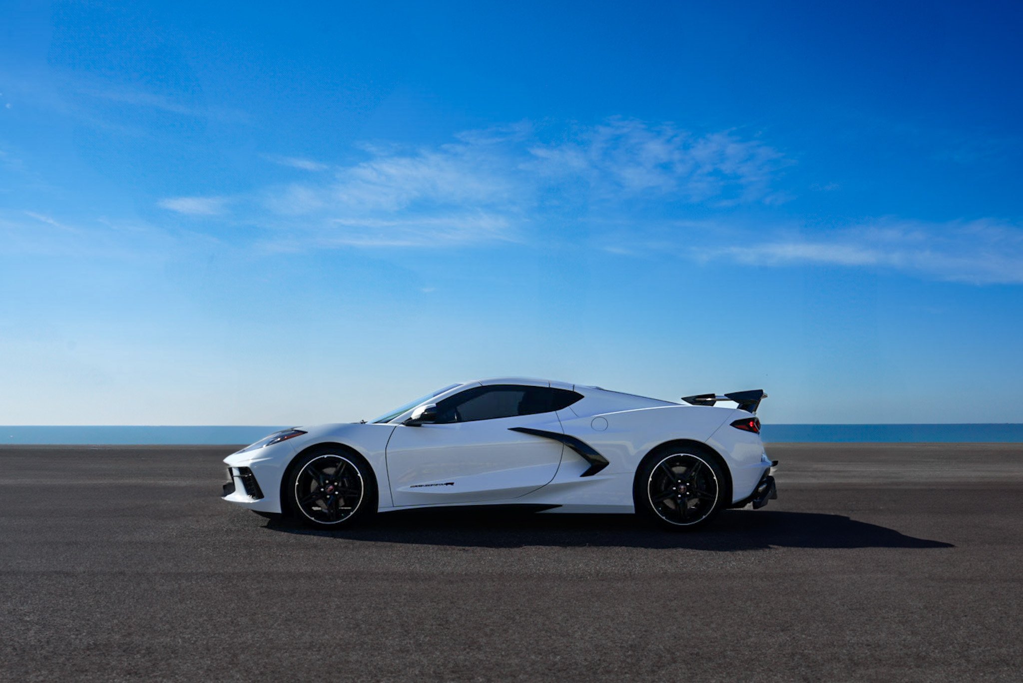 White 2022 Chevrolet Corvette 2LT  along Courtney Campbell Causeway, Tampa FL.