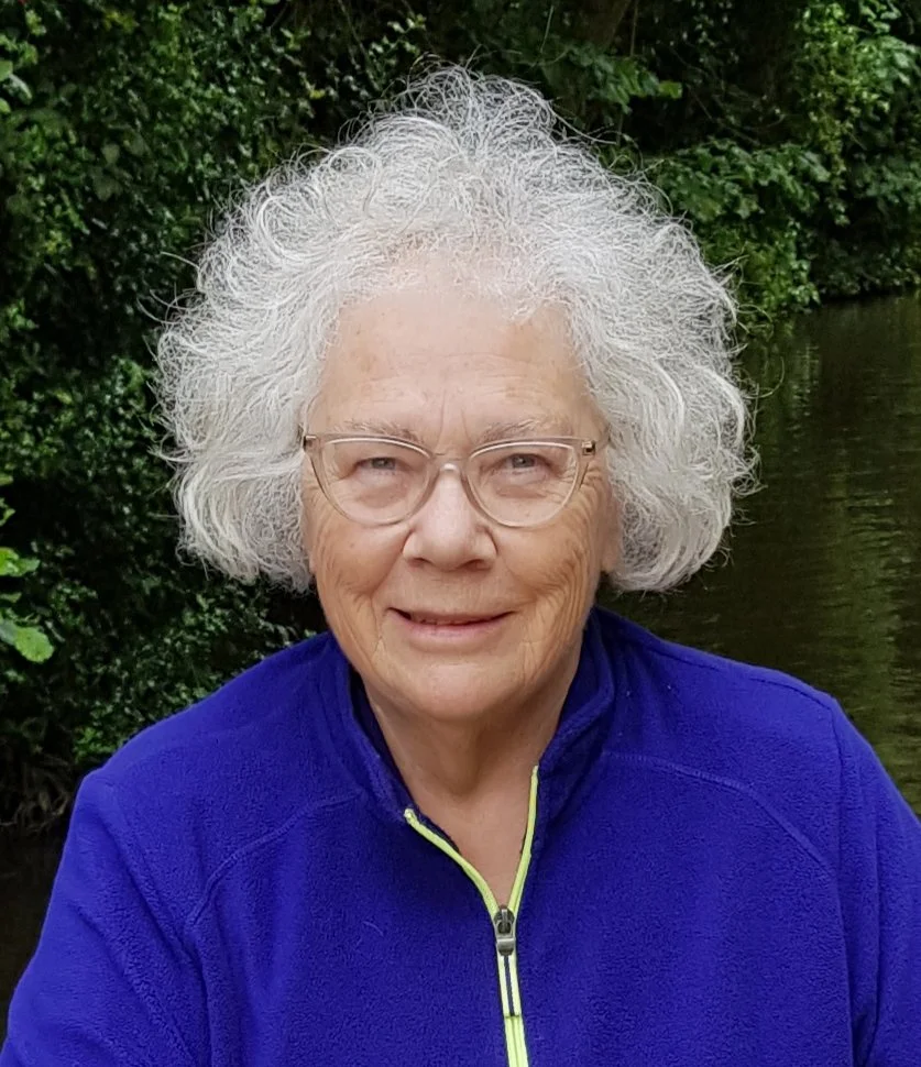 Portrait of author and speaker Susan Ackroyd outdoors.