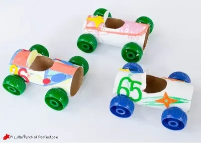 Cars made from cardboard tubes and applesauce pouch lids