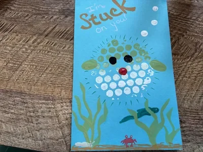 A card with a puffer fish stamped with bubble wrap and the words I'm stuck on you!