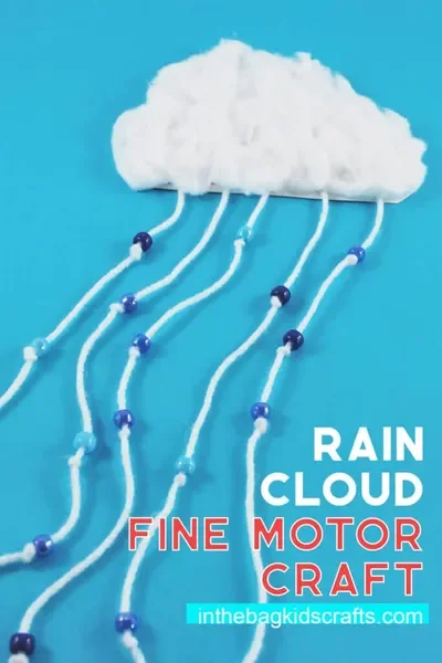 A fluffy cloud made from cotton balls with blue raindrop beads on white yarn. The title text "Rain Cloud Fine Motor Craft" and subheader inthebagkidscrafts.com