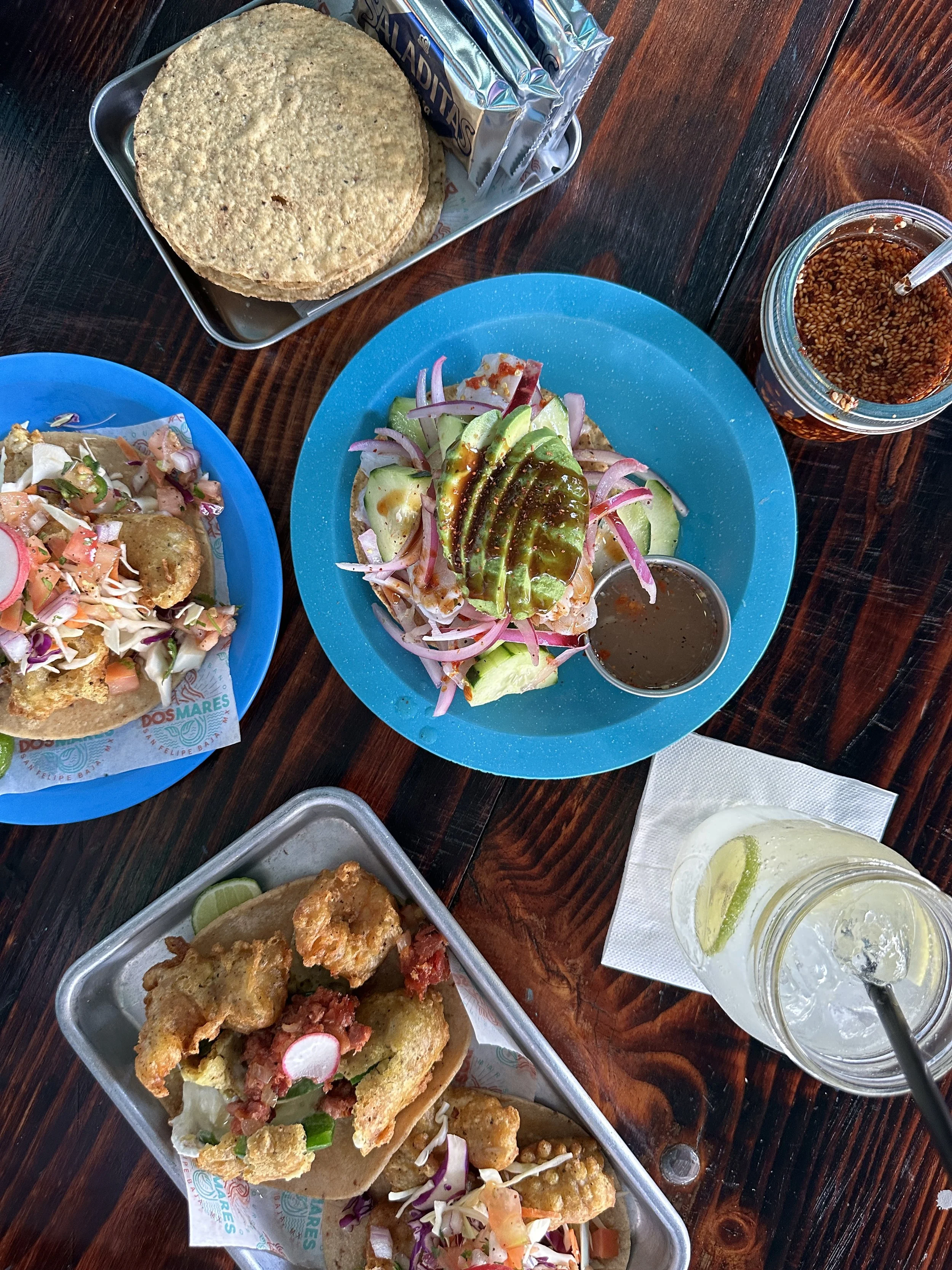Fish tacos and lemonade on a wooden table showcasing coastal Mexican food in San Felipe Baja