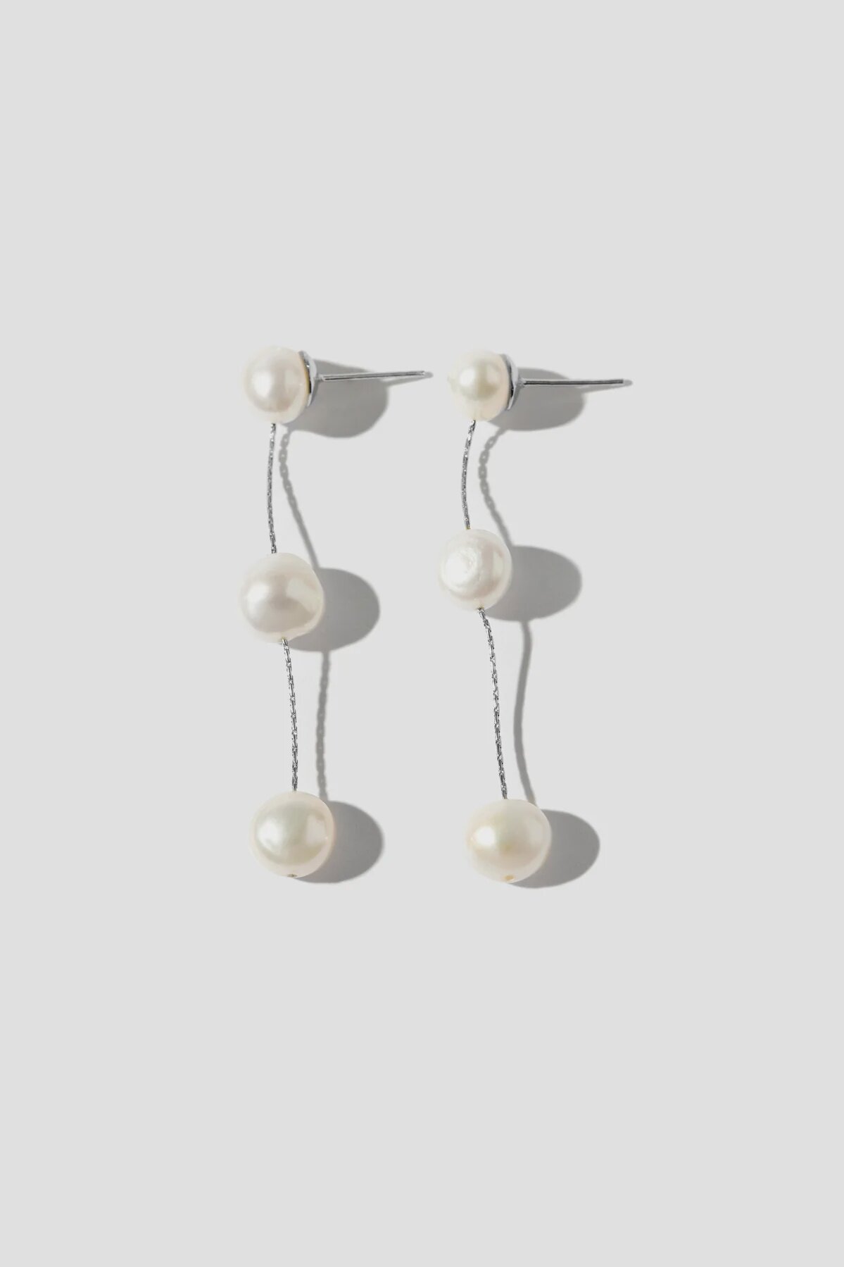 Amelie-George-Imogen-Medium-Silver-Pearl-Wedding-Earrings_1199x1800.webp