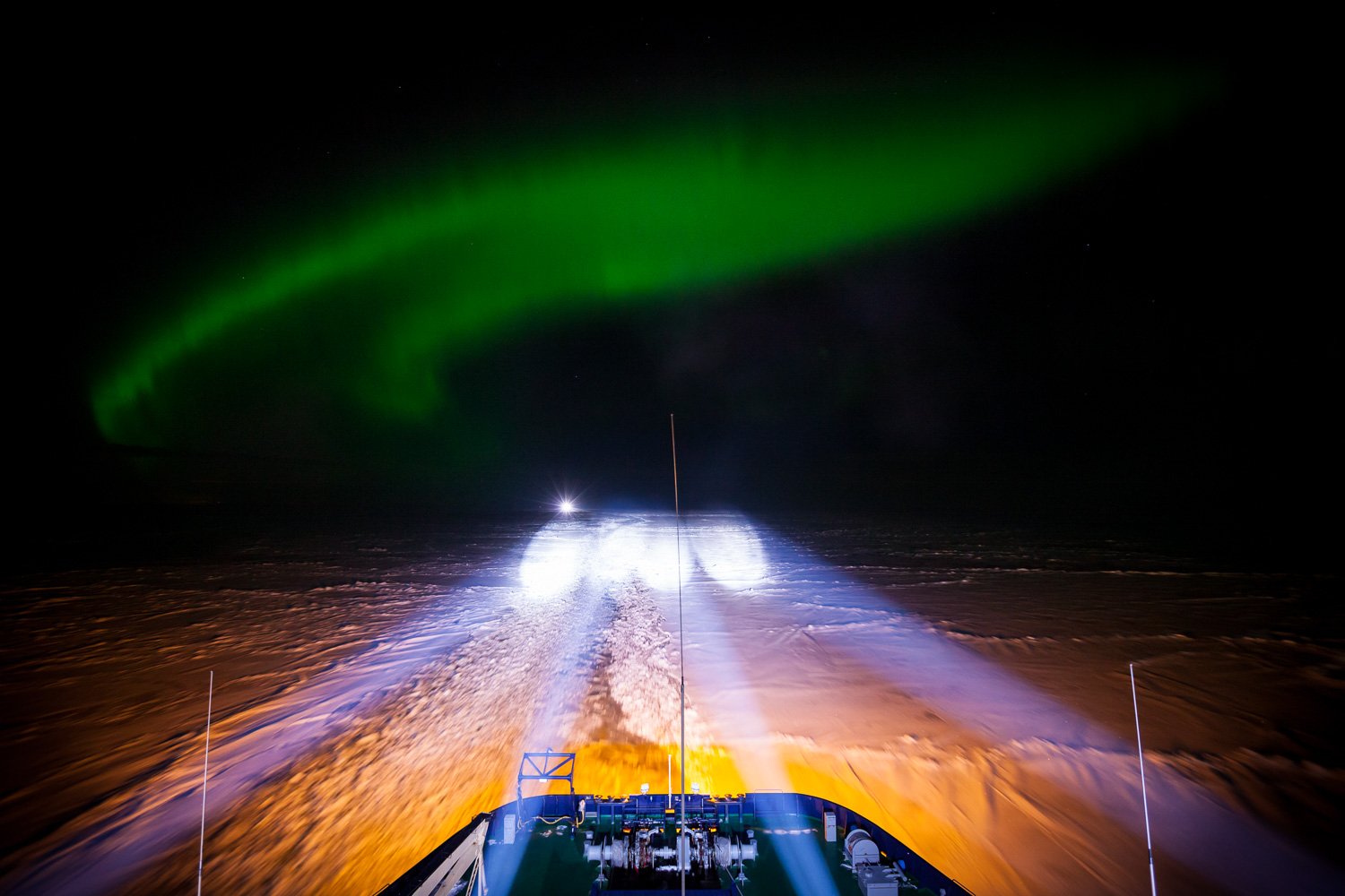 The northern lights are dancing in the polar night and the icebreaker Oden is on its way to meet the icebreaker Atle somewhere in the frozen icy landscape of the Gulf of Bothnia.