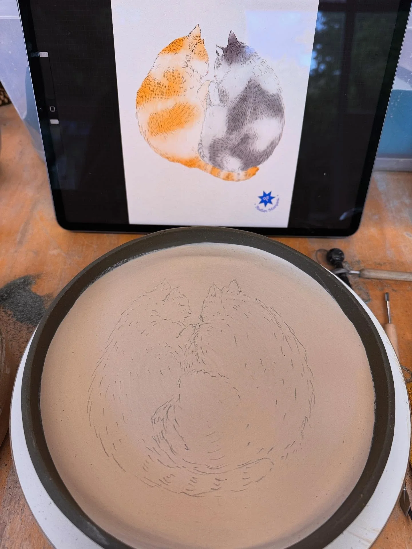 Black clay + carving, working with a sketch of mine of our cats Kaju and Barfi 🐈&zwj;⬛🐈.