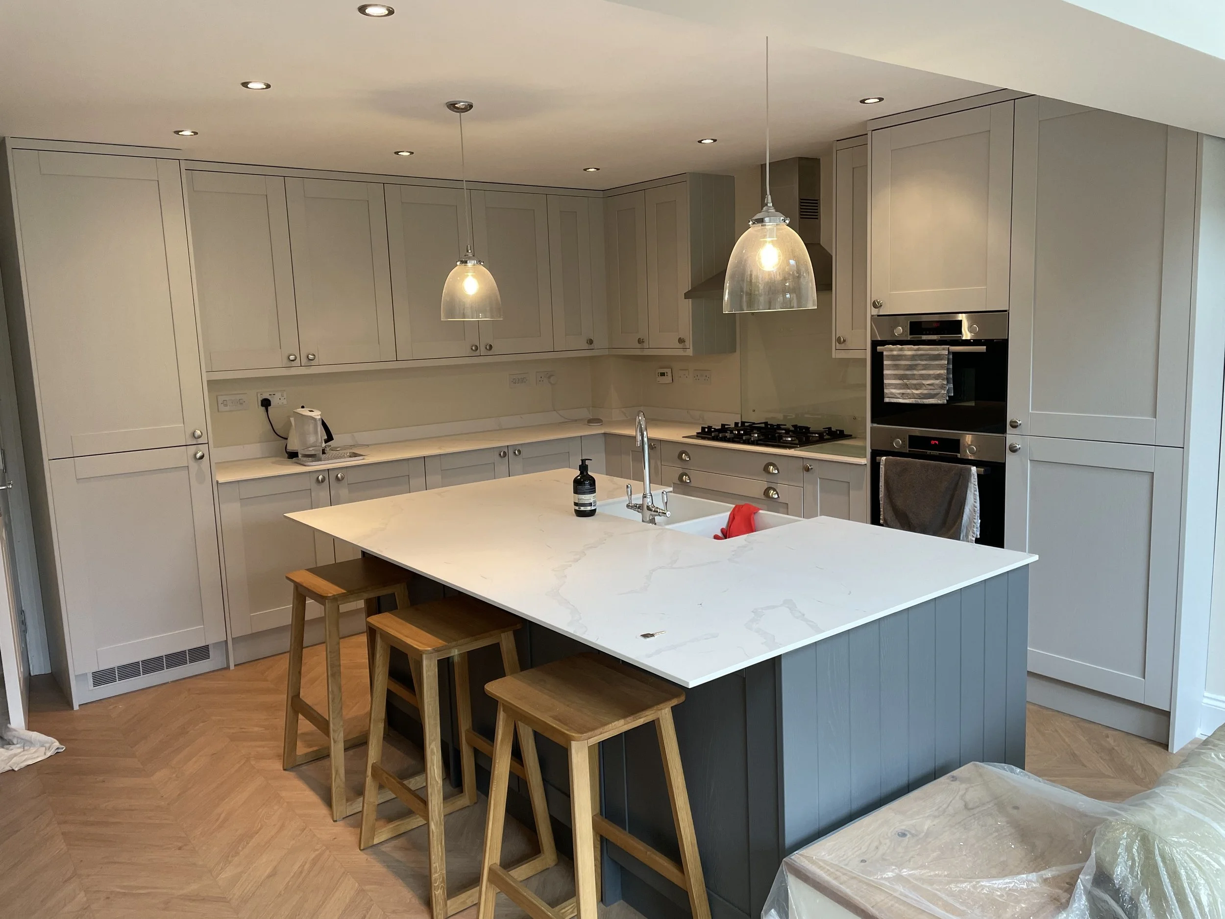 Kitchen Installation Nottingham carrara marble top grey units wood floor chevron.jpg