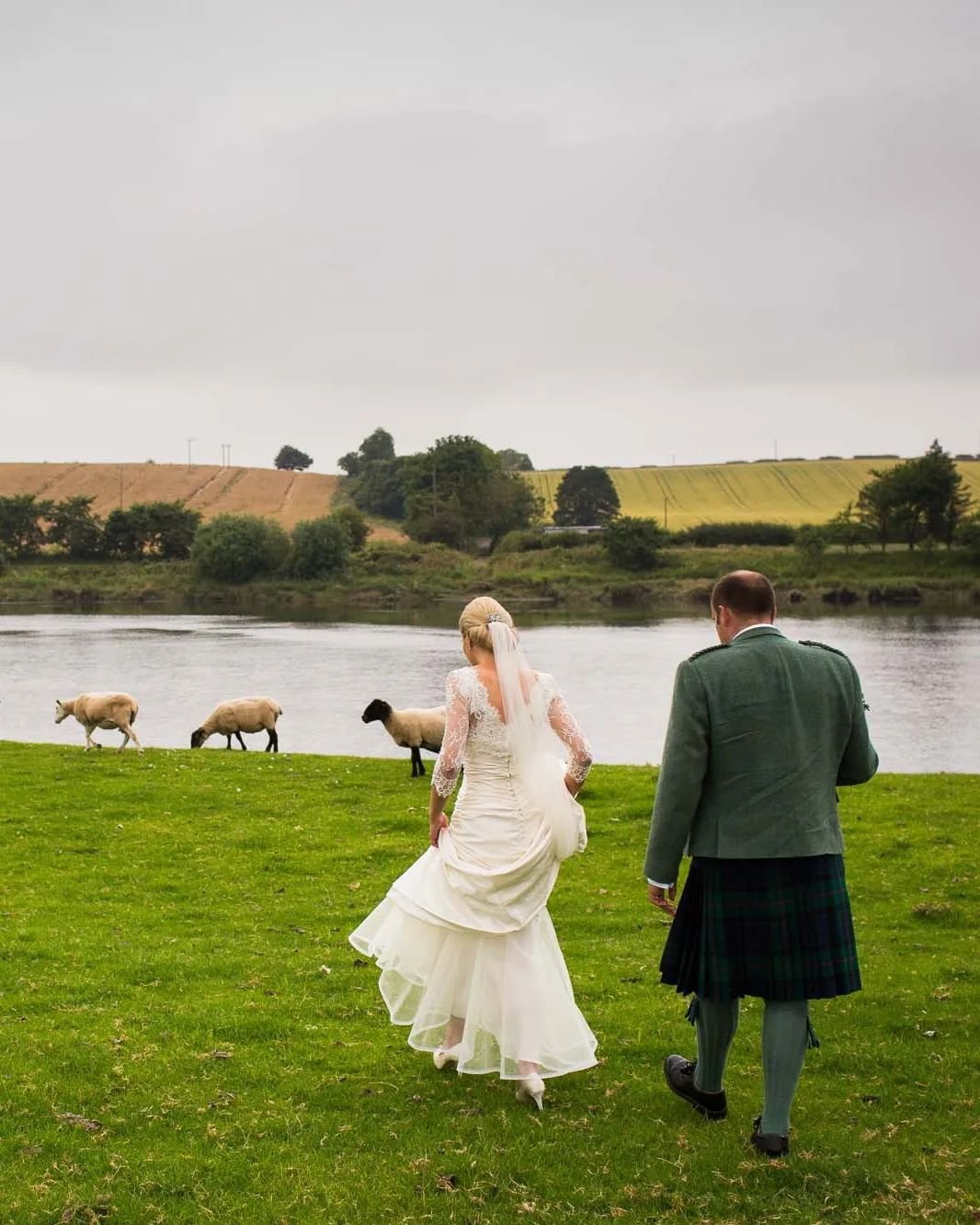 Sharing the banks of the River Tweed with some woolly friends..

Jen &amp; Andy

Taking a few minutes away from guests during their marquee wedding in Northumberland. 

#northumberlandweddingphotographer
#coupleportrait
#northeastweddingphotographer
