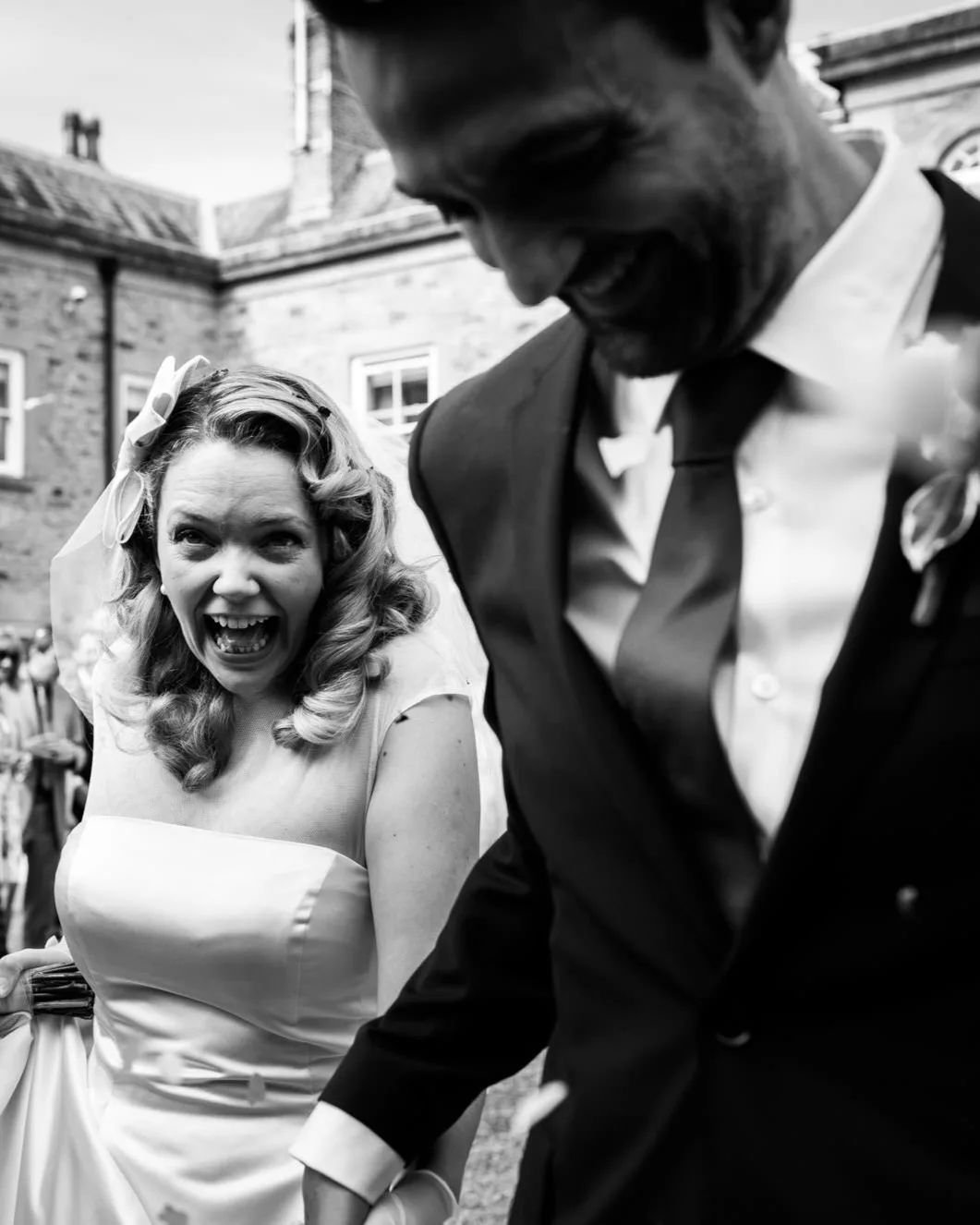 Rachel &amp; Rick bracing themselves for the oncoming confetti in the face run.

@whitworthhall

#whitworthhall #northeastweddingphotographer #confetti #blackandwhitewedding #candidweddingphotography #2025bride