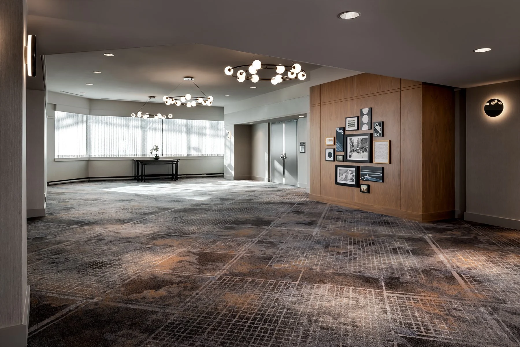 Outside function spaces with wood wall panelling and carpet