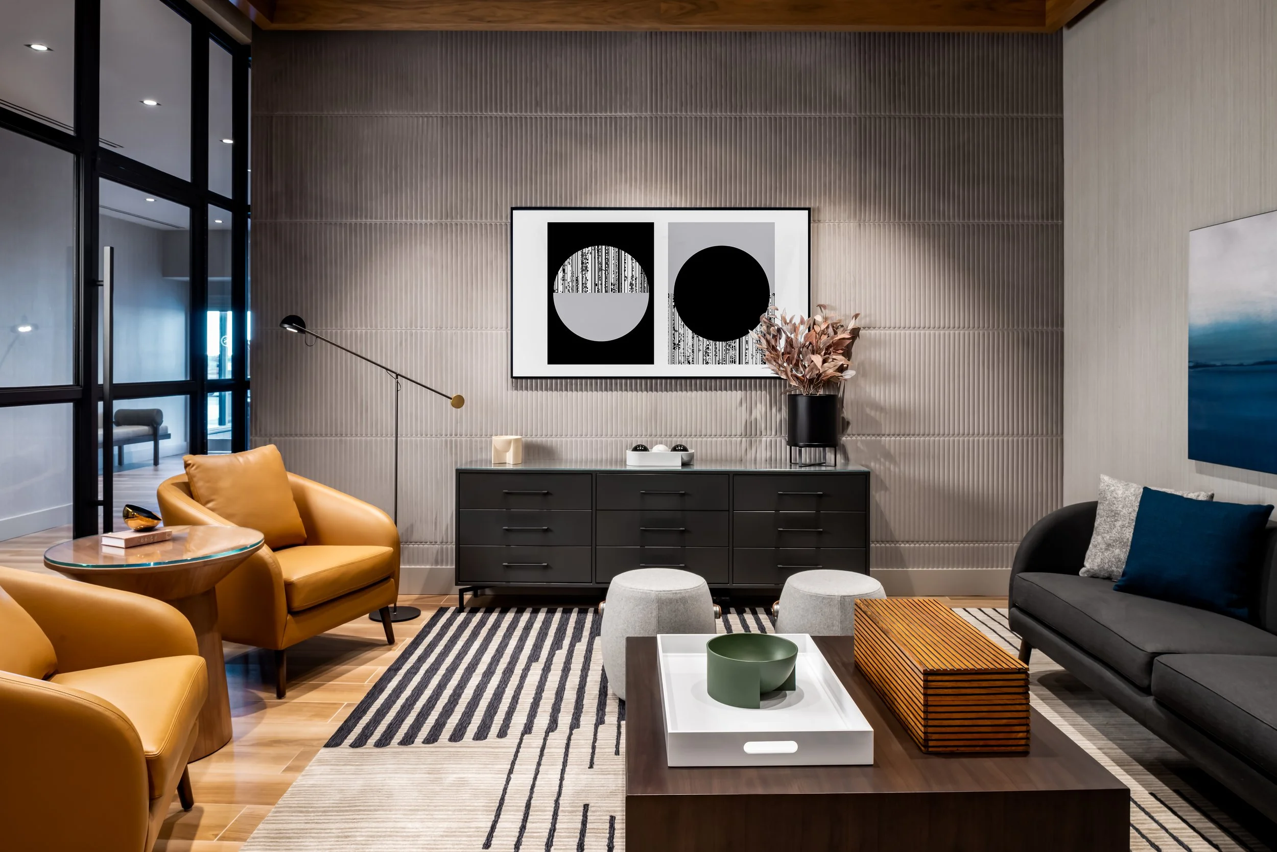 Meeting room with upholstered lounge seating and console table