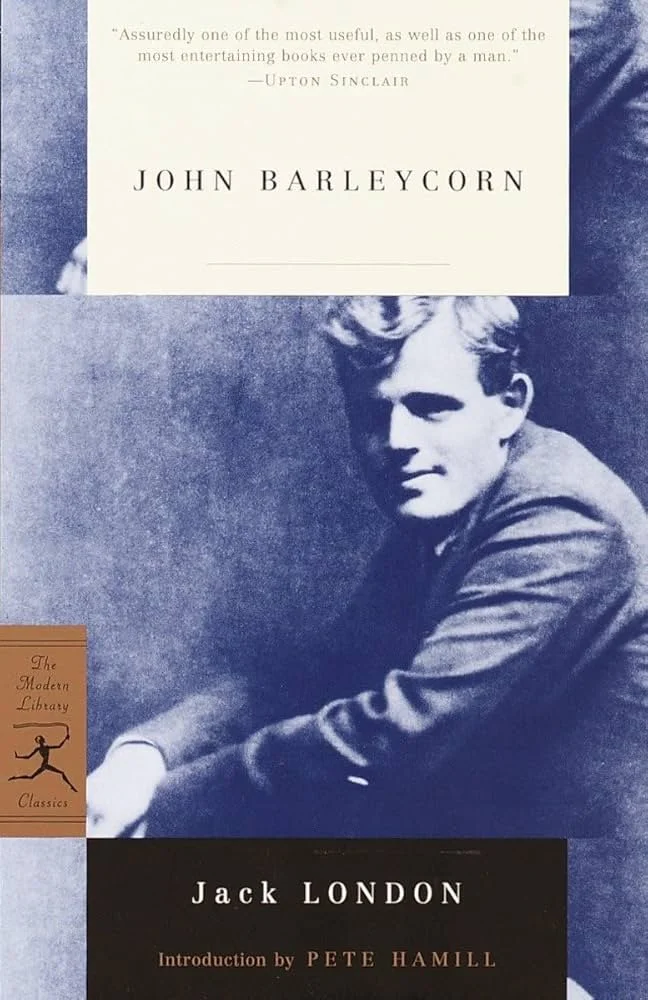 Book cover featuring a black-and-white photograph of a young man with light hair, dressed in a suit jacket, sitting and looking to the side. The title is 'John Barleycorn' by Jack London, with an introduction by Pete Hamill. There is a quote at the top, and a small orange logo on the bottom left corner.