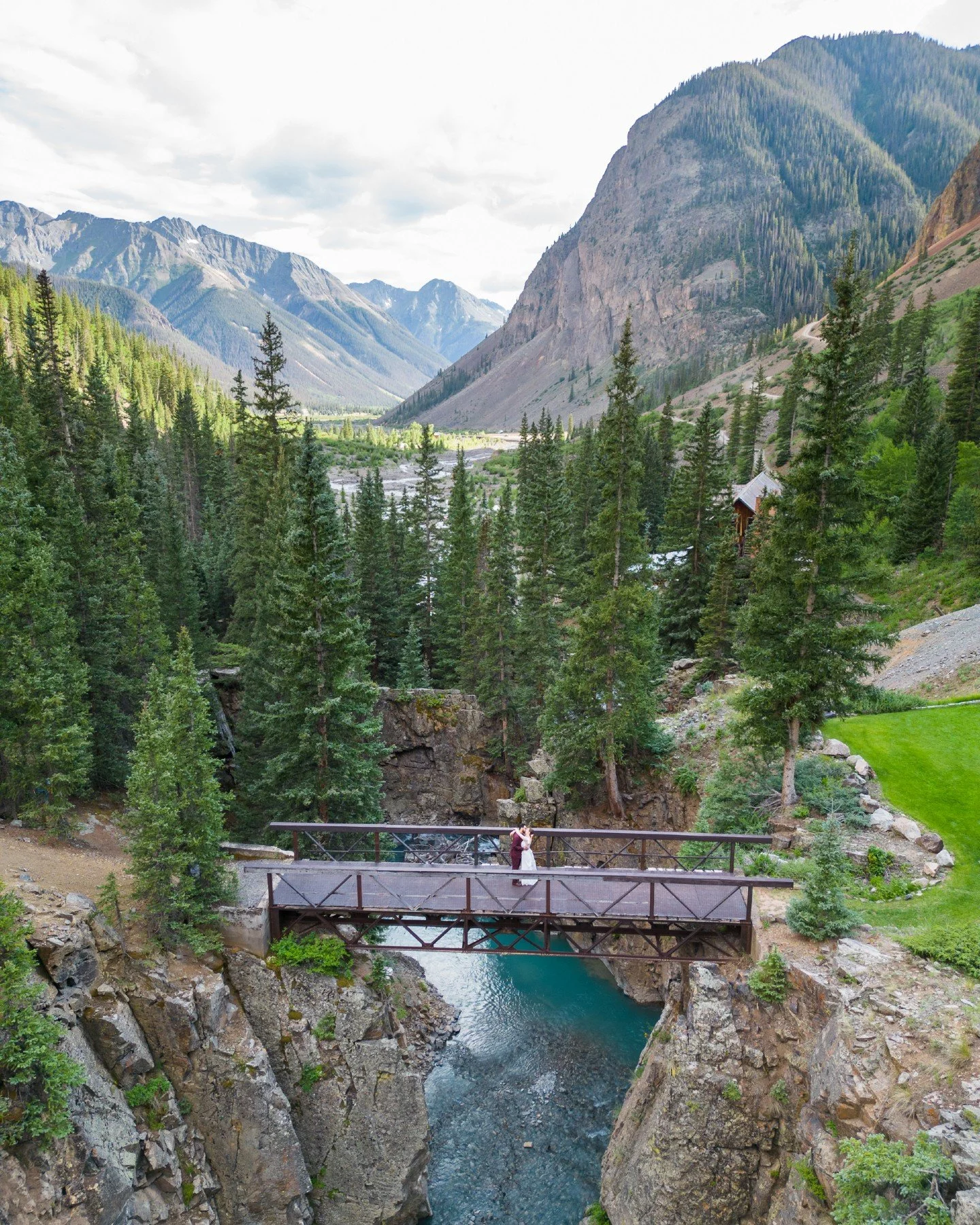 Erin and Mo's Silverton, Colorado, elopement was a beautiful expression of love; full of intention, fun, and heart. The day before, they held a henna ceremony to honor Mo&rsquo;s Indian heritage, and Erin walked into the mountains with intricate desi