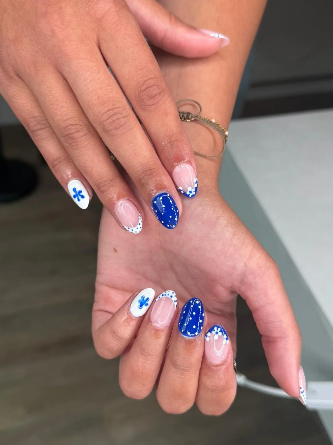 Floral details + dots are a whole vibe! 💙

Save this inspo for your next mani. ✨

📍Thirteen Beauty Bar &ndash; La Cantera
📲 Appointments open &mdash; link in bio