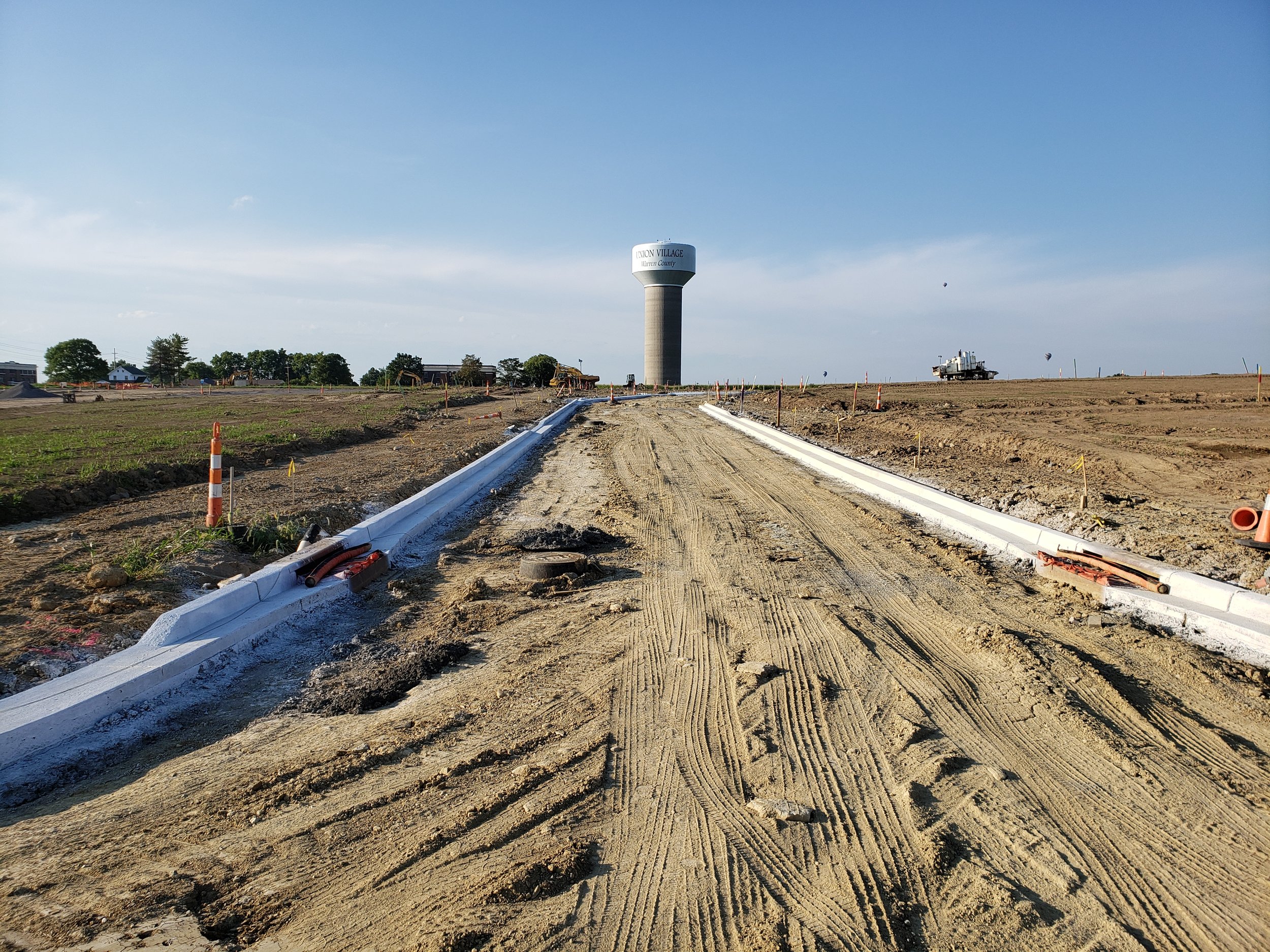Curb Installation Underway for Union Village Streets
