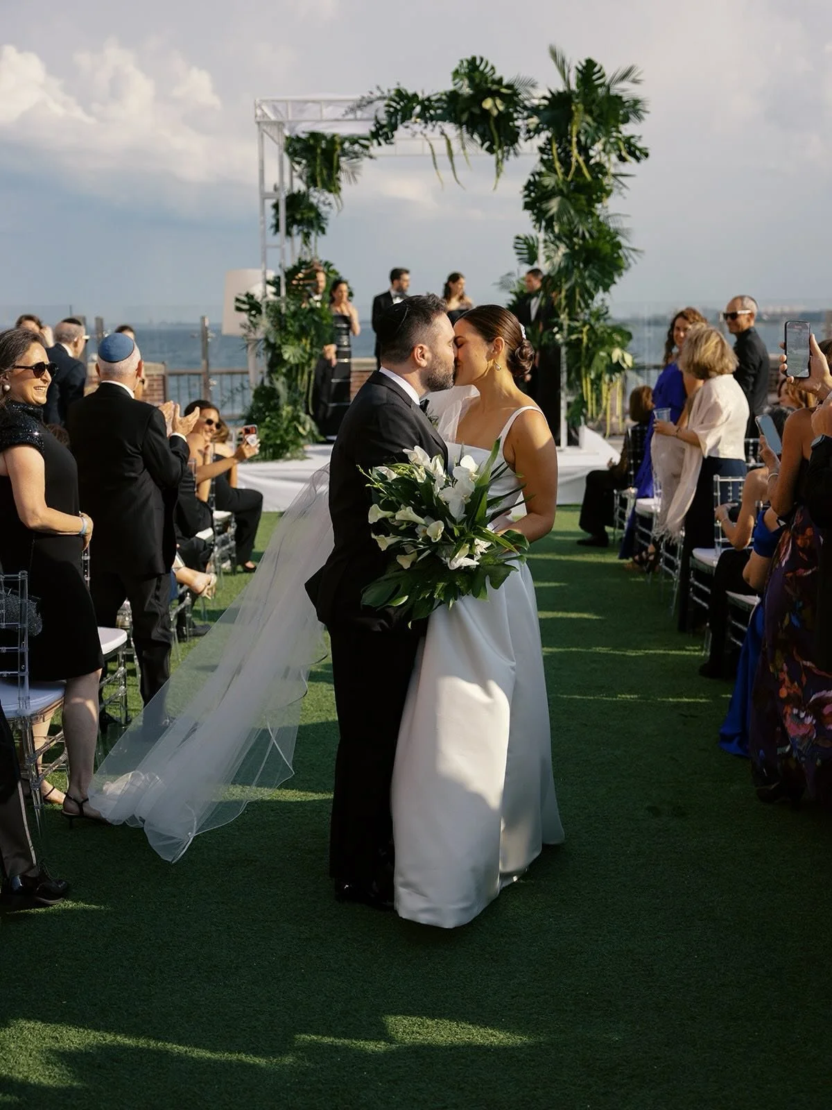 When a couple chooses a place that already means something to them, you handle it with special care.

For Lisa, being married beside Lake Michigan had been in her mind long before there was a date on the calendar. Chicago is where she and Adam grew u