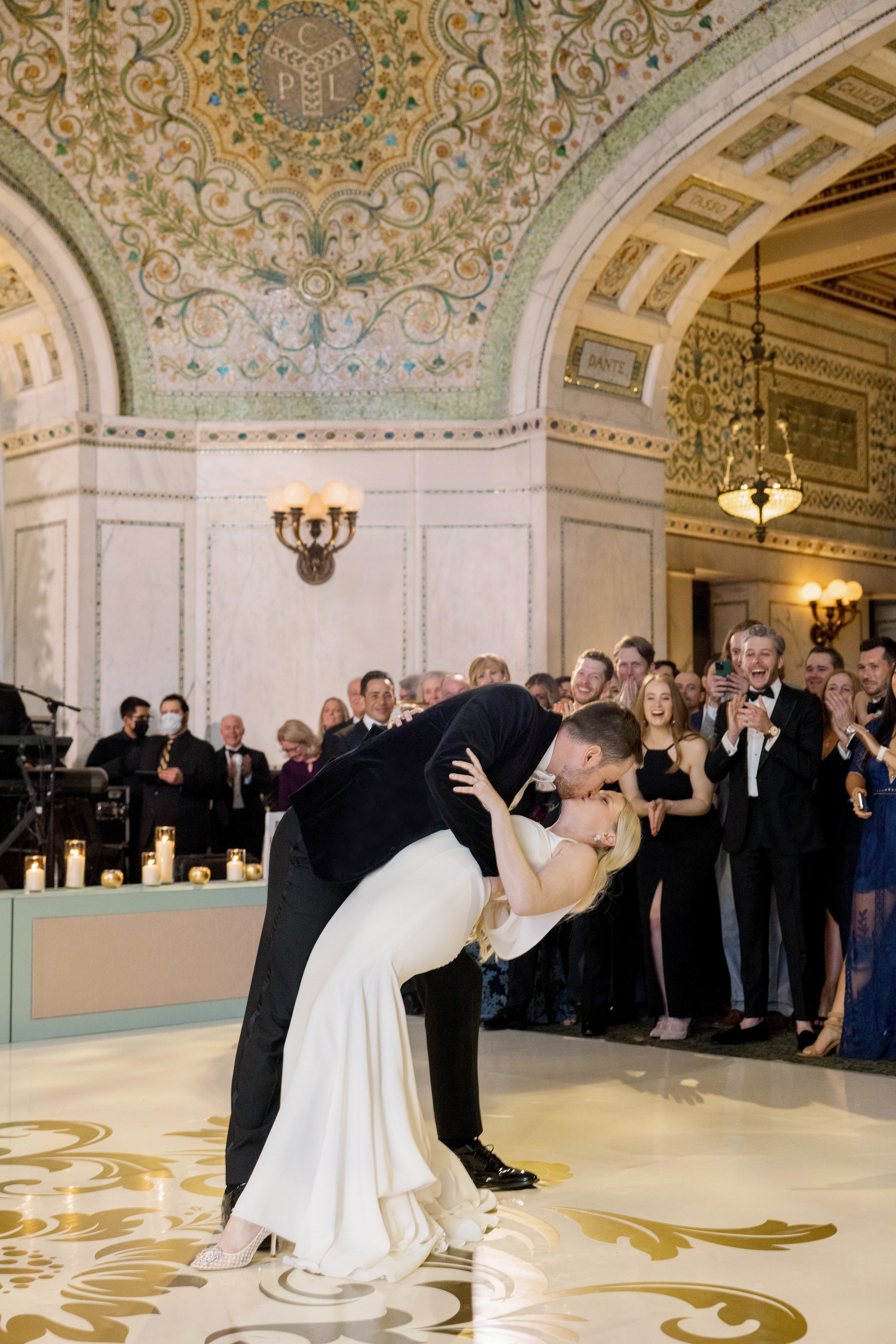 Beth Bernstein Events groom kissing the bride chicago cultural center wedding