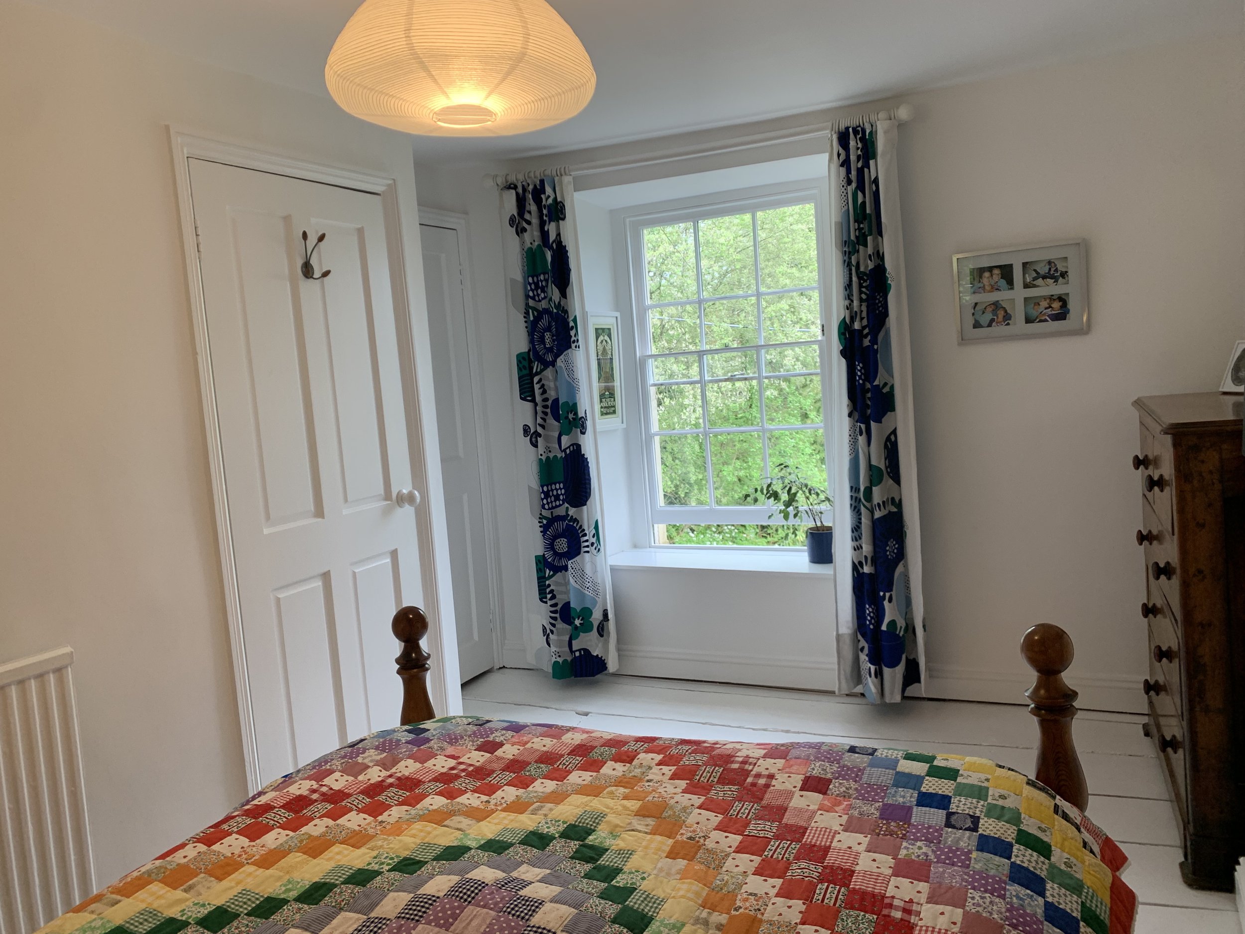 Bedroom 3 on first floor: the door next to the window houses a large built in wardrobe/cupboard