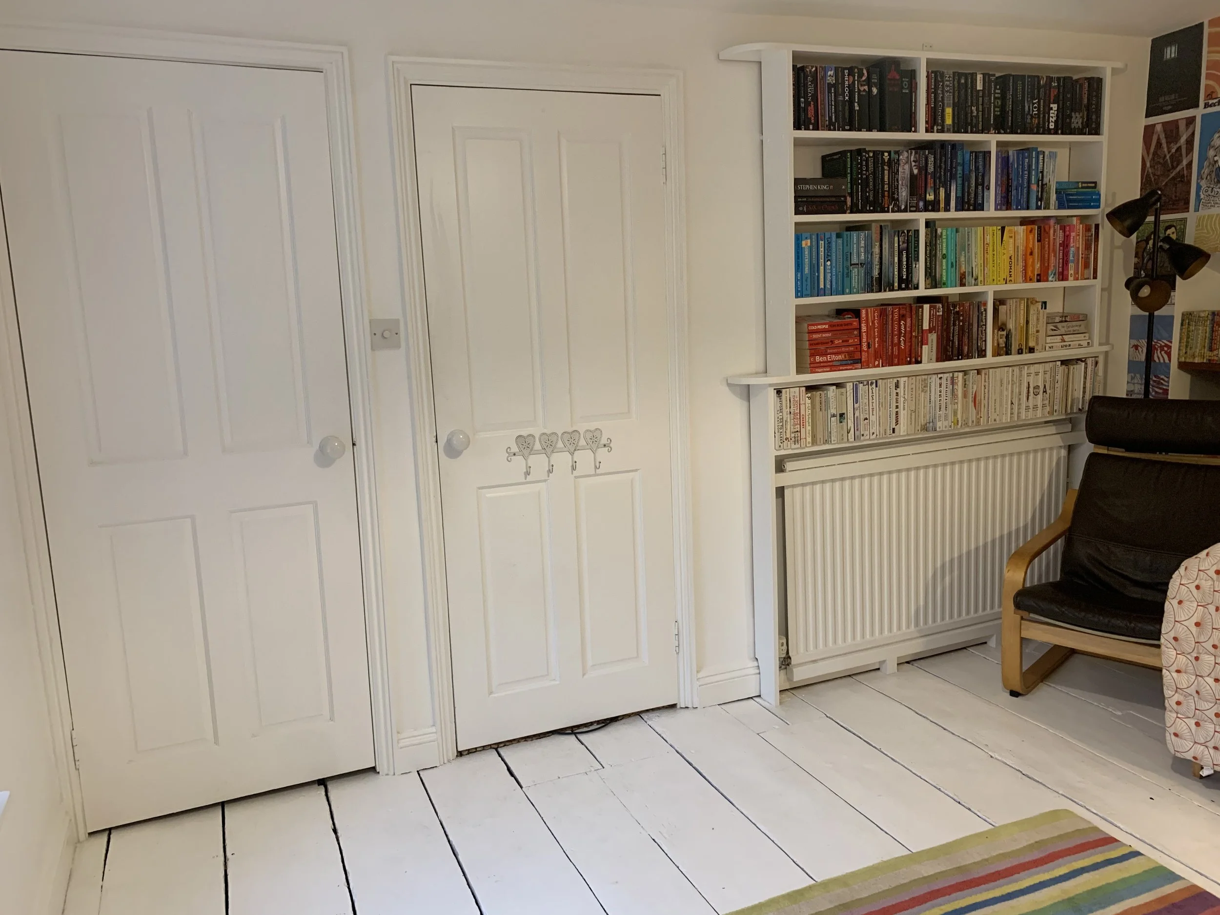 Bedroom 2 on first floor - showing door (on right) and wardrobe on left. These wardrobes are huge: similar storage is in bedroom 1, 2, 3 and 4 (study)