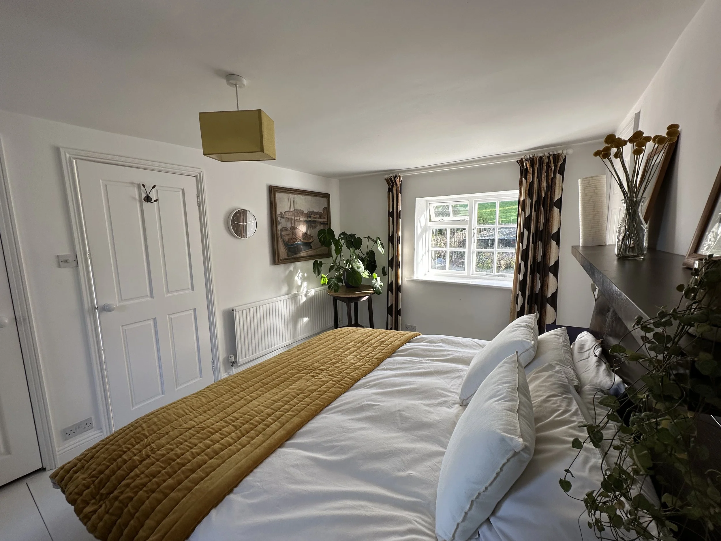 Main bedroom 1: on top floor with windows on both sides of house: with three built in wardrobes