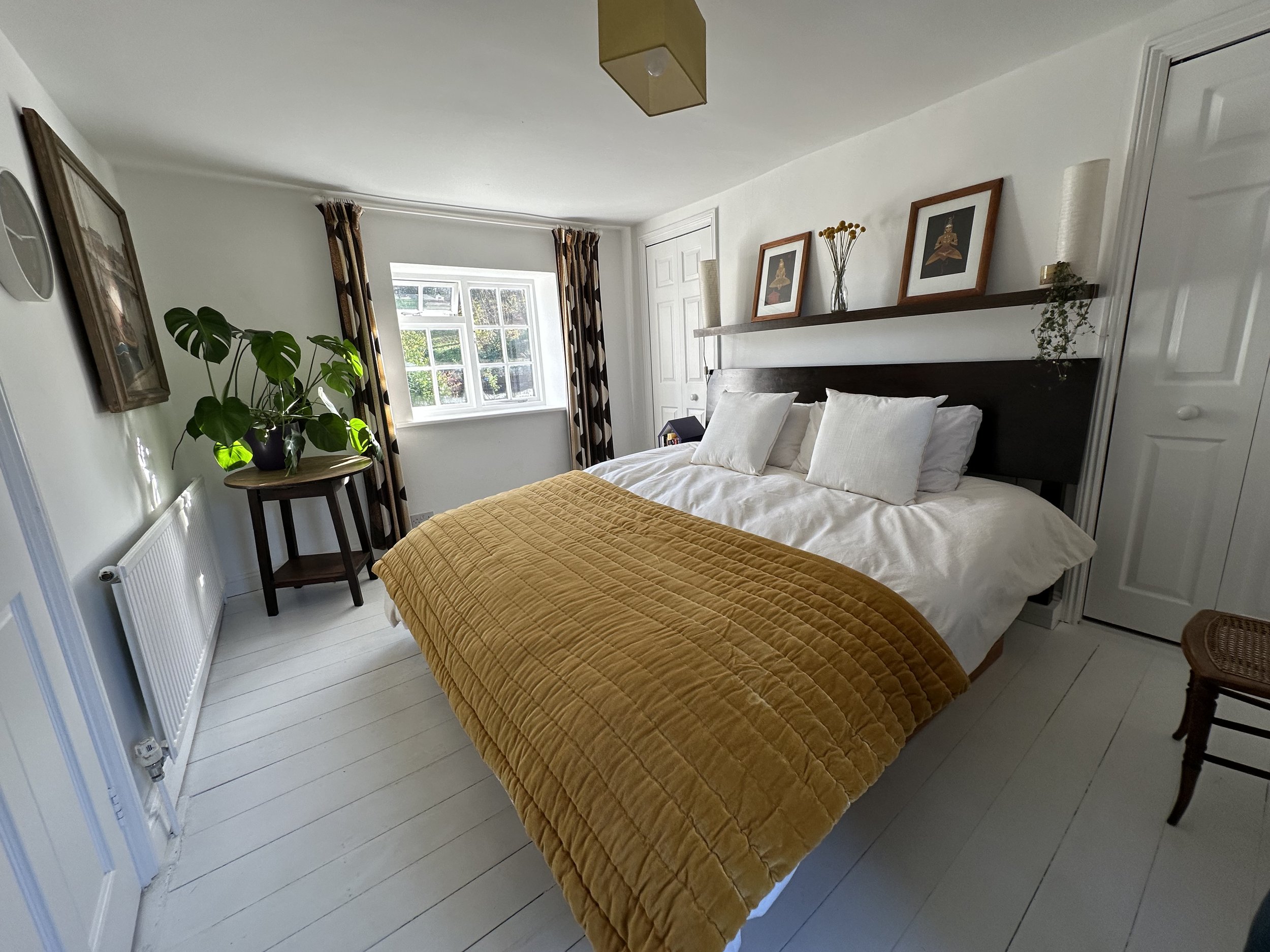 Main bedroom 1: on top floor with windows on both sides of house