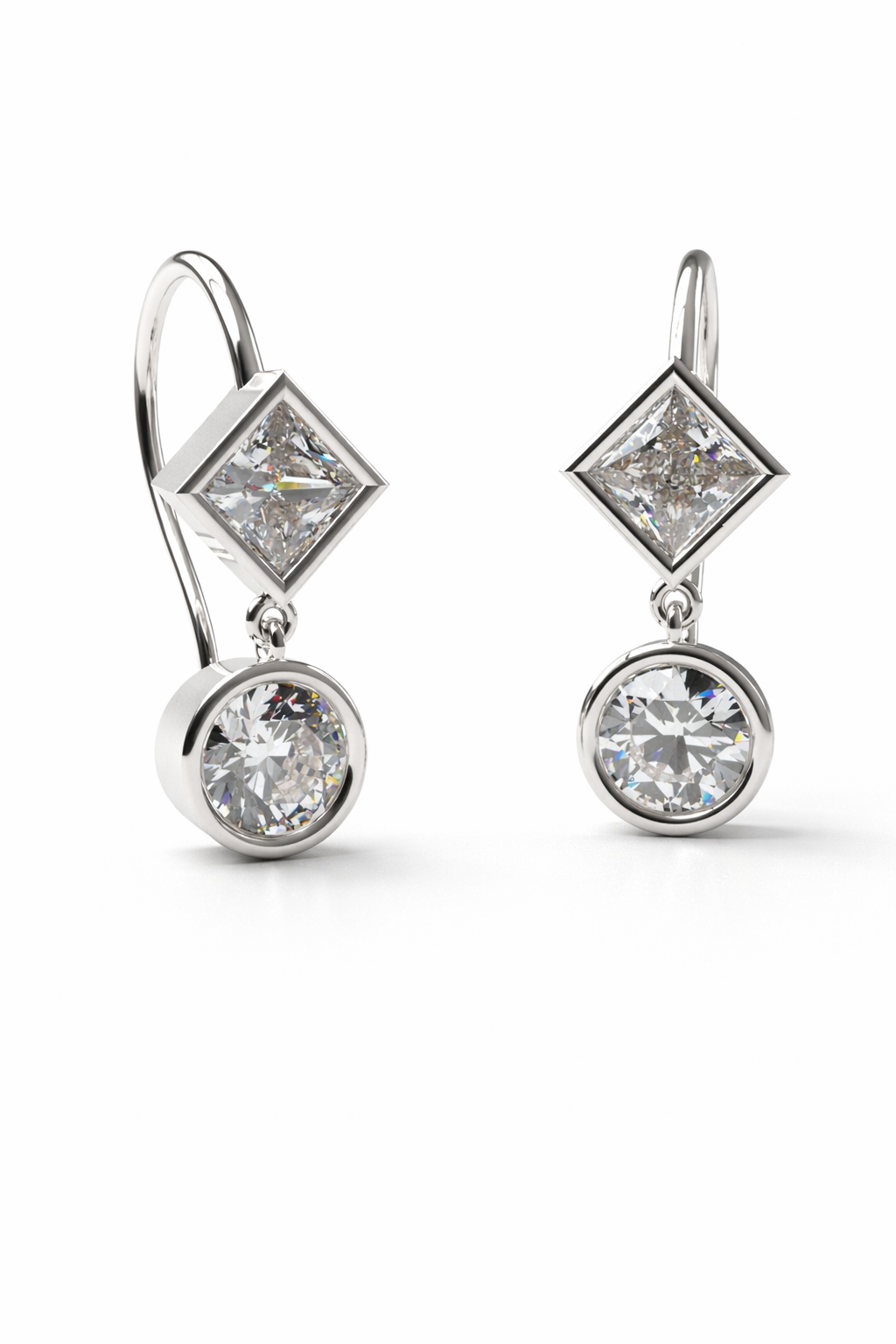 Elegant white gold drop earrings.png