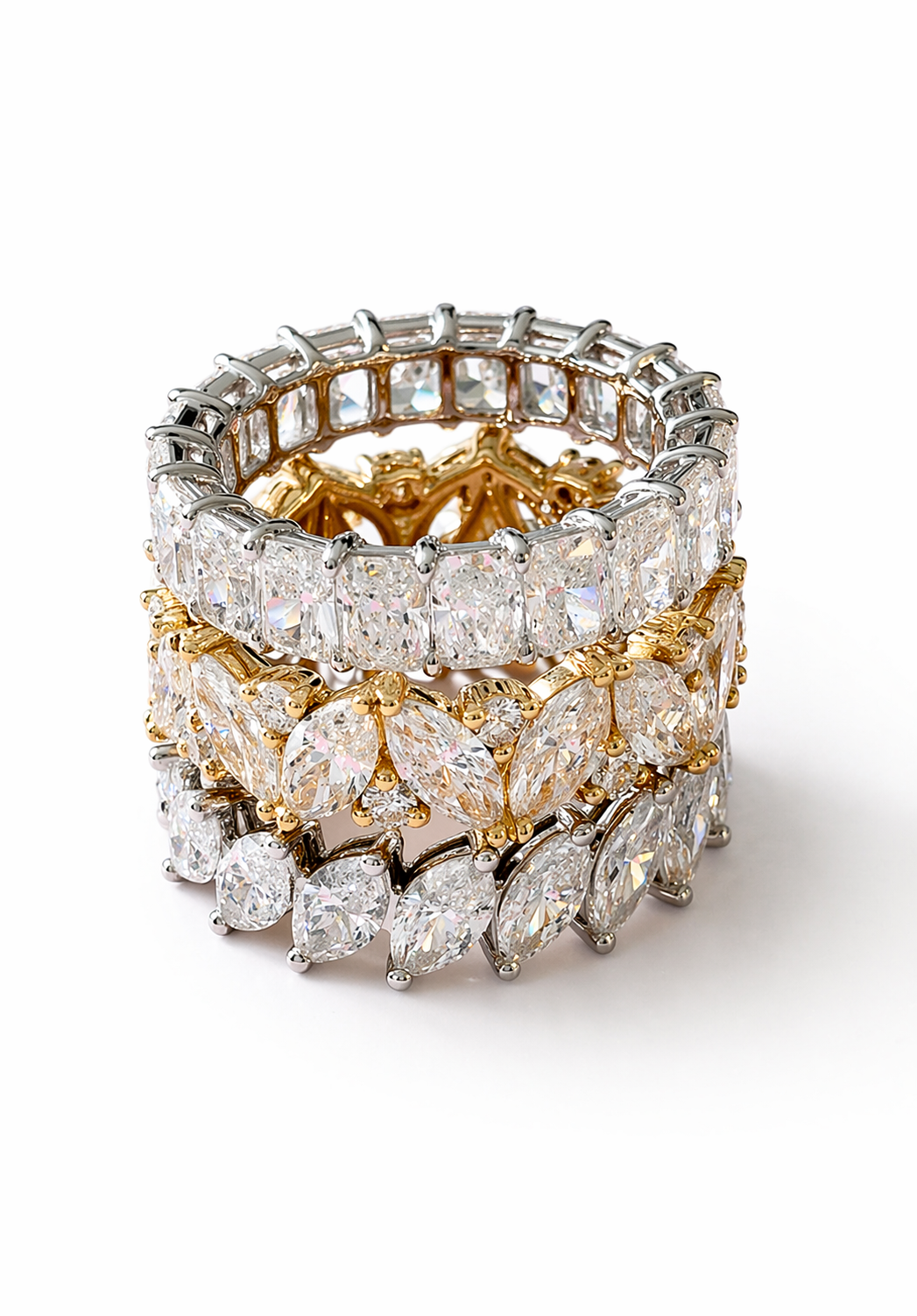 Luxurious diamond ring stack on white.png