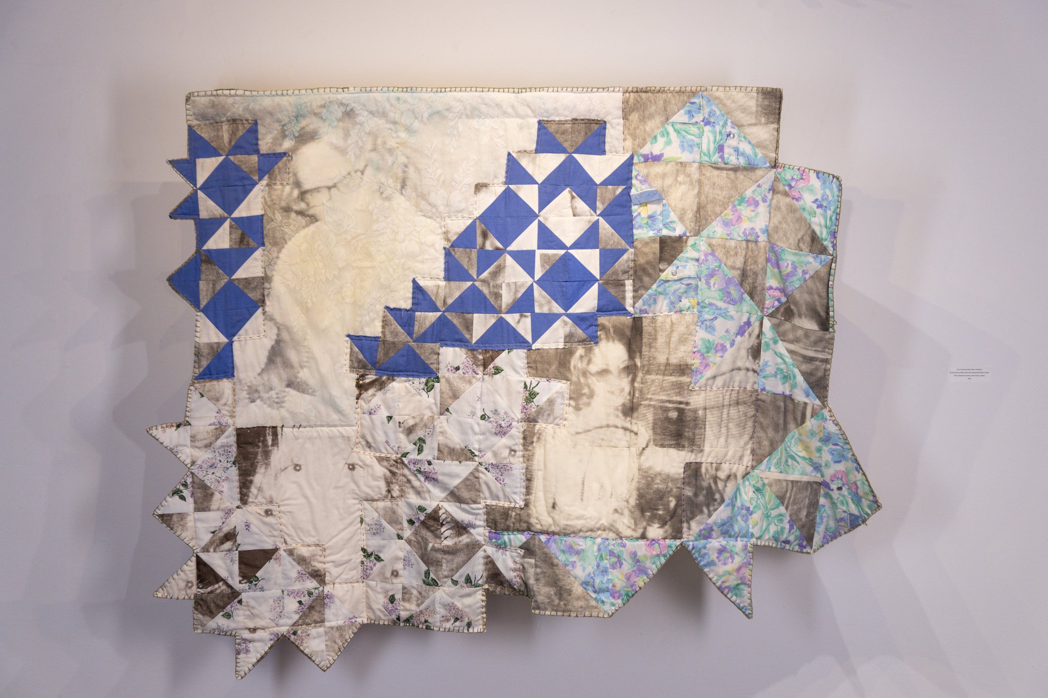 From the Same Cloth (Sewn Together),
Screen print on fabric quilt with repurposed fabrics: house dress, bedroom curtains, church dress, sheets,
2025