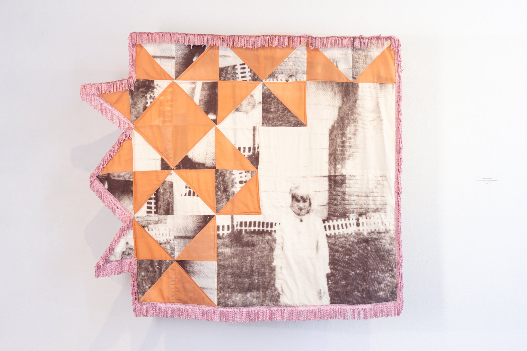 The House That Raised Us,
Screen print on fabric quilt with repurposed fabrics: sun-bleached curtains,
2024