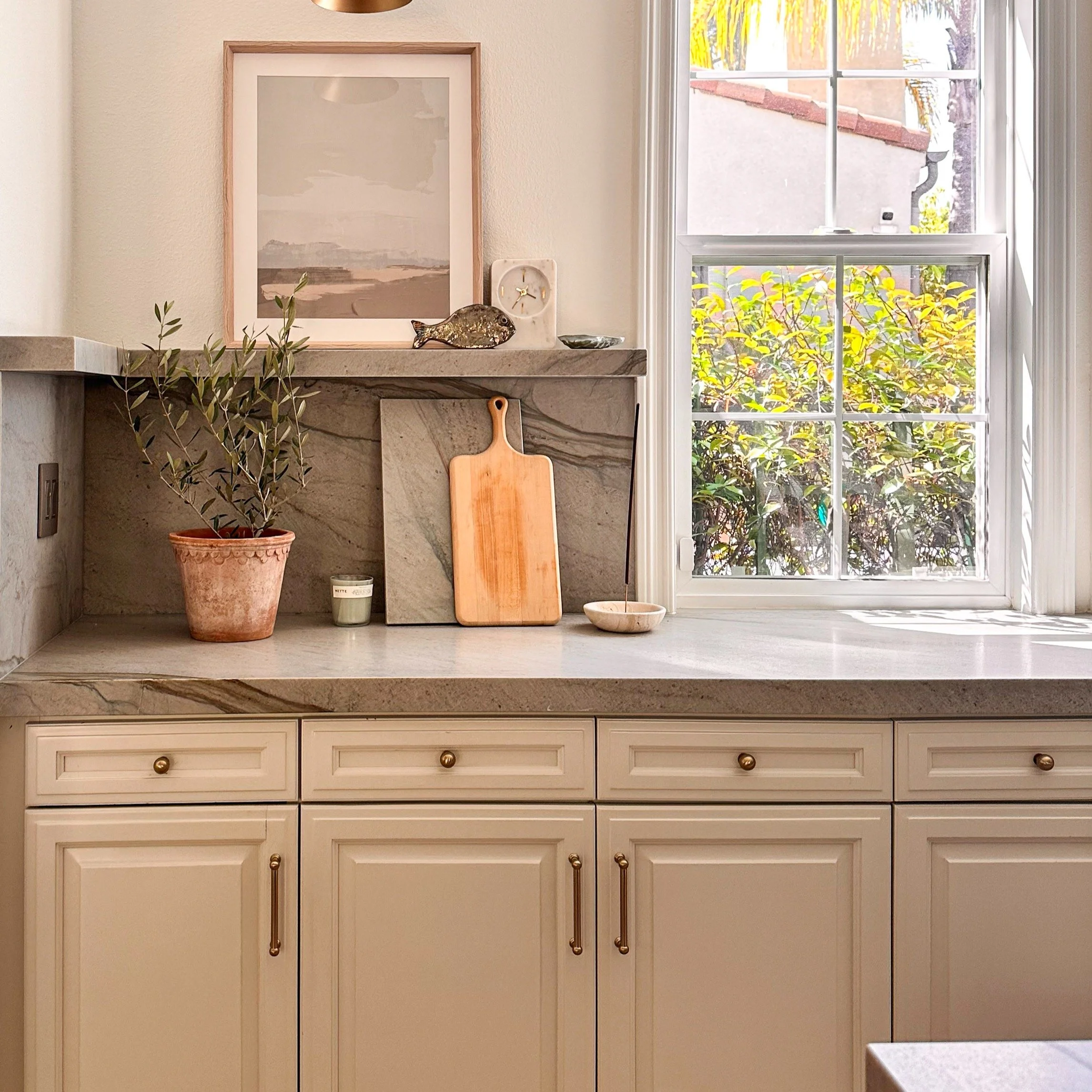 These clients love to travel and wanted their kitchen to include special pieces they&rsquo;ve collected and genuinely enjoy. We thoughtfully edited and arranged their favorite items, giving each one room to stand out without making the space feel bus