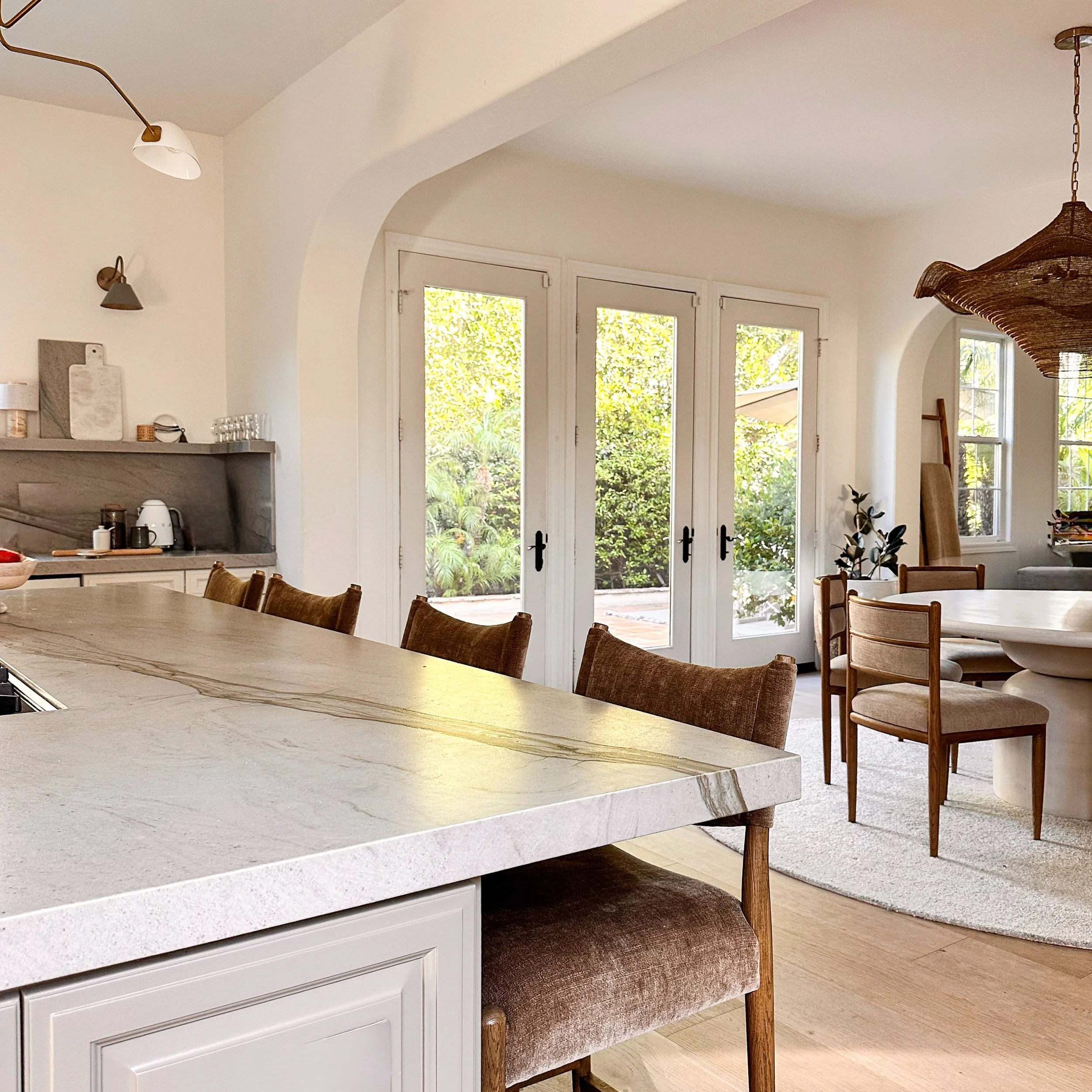 The most-used room in a home should be designed for the way a family actually lives.

This large family room and eat-in kitchen needed to work for everyday meals, game nights, relaxing and hosting friends. We created distinct areas for each activity 