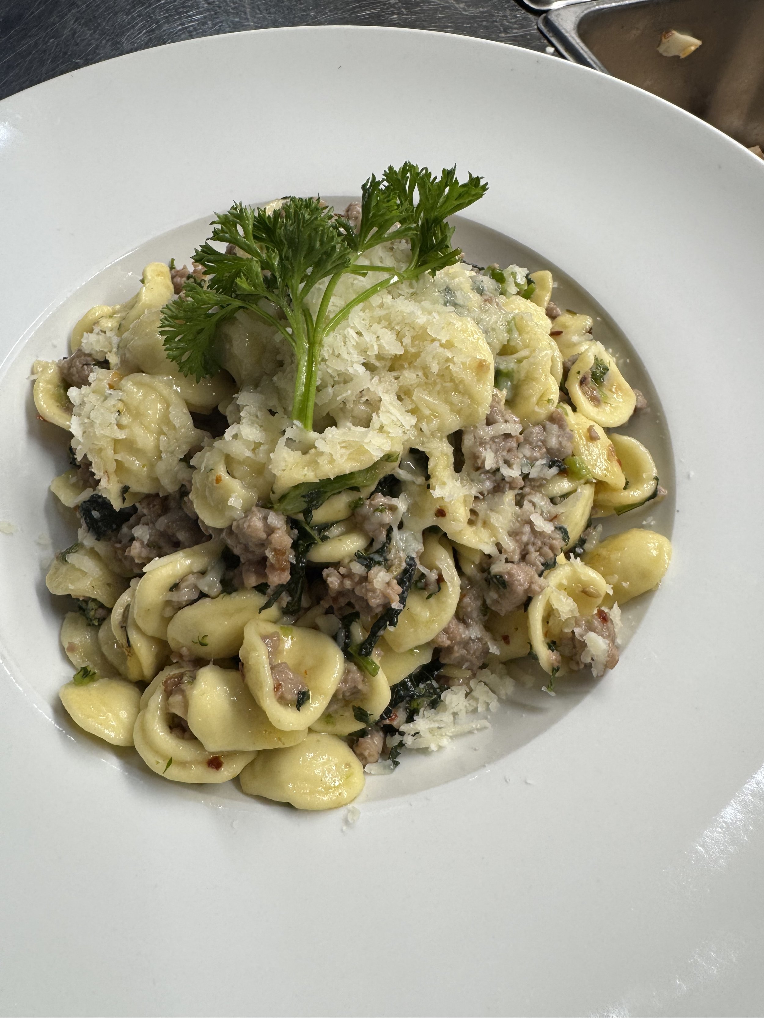 Taste the heart of Italy! Our signature orecchiette pasta with savory house-made sausage ragu and freshly grated parmesan. Come enjoy the best Italian-inspired cuisine for dinner tonight on St Clair West.