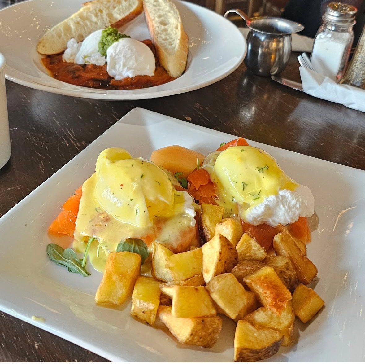 Delicious Eggs Benedict with home fries at Desotos Eatery Jazz Brunch Toronto.