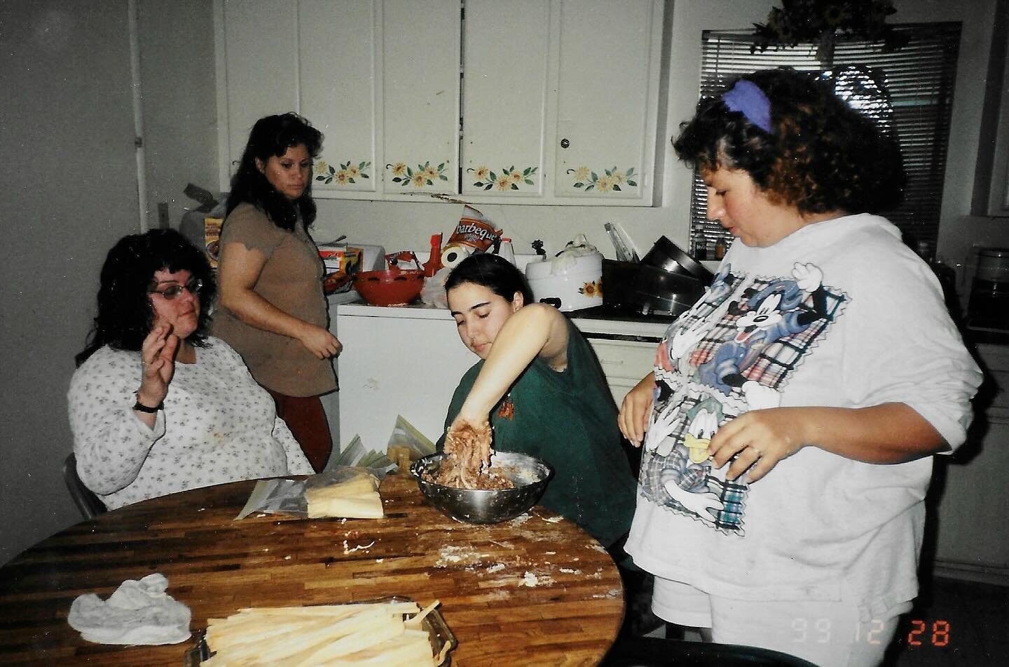 Angela making the infamous chocolate tamales. Christmas in &lsquo;99 🫔
