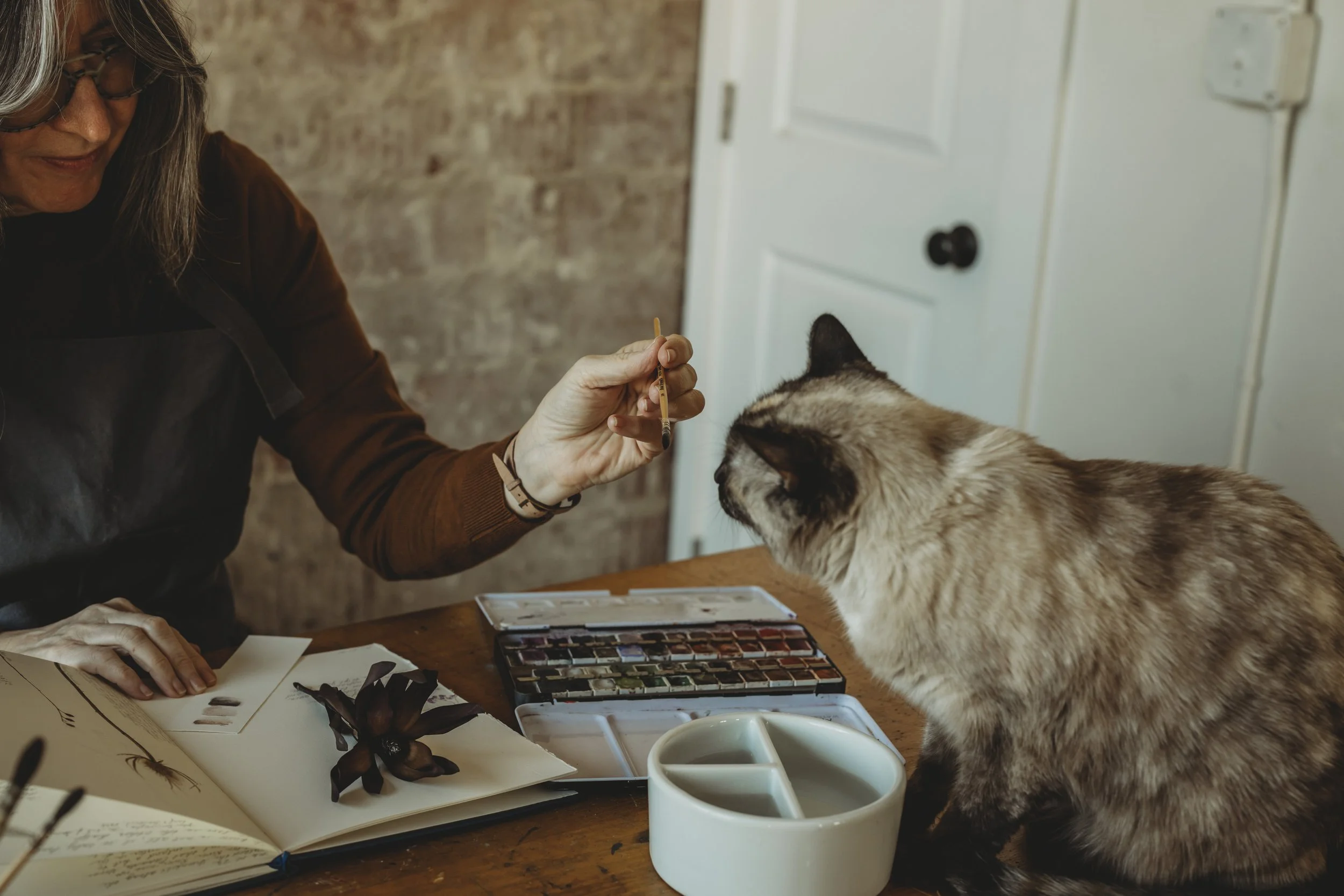 artist with cat.jpg