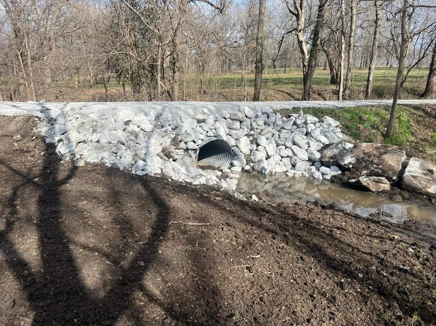 Culvert Installation using pipe and covered with stone