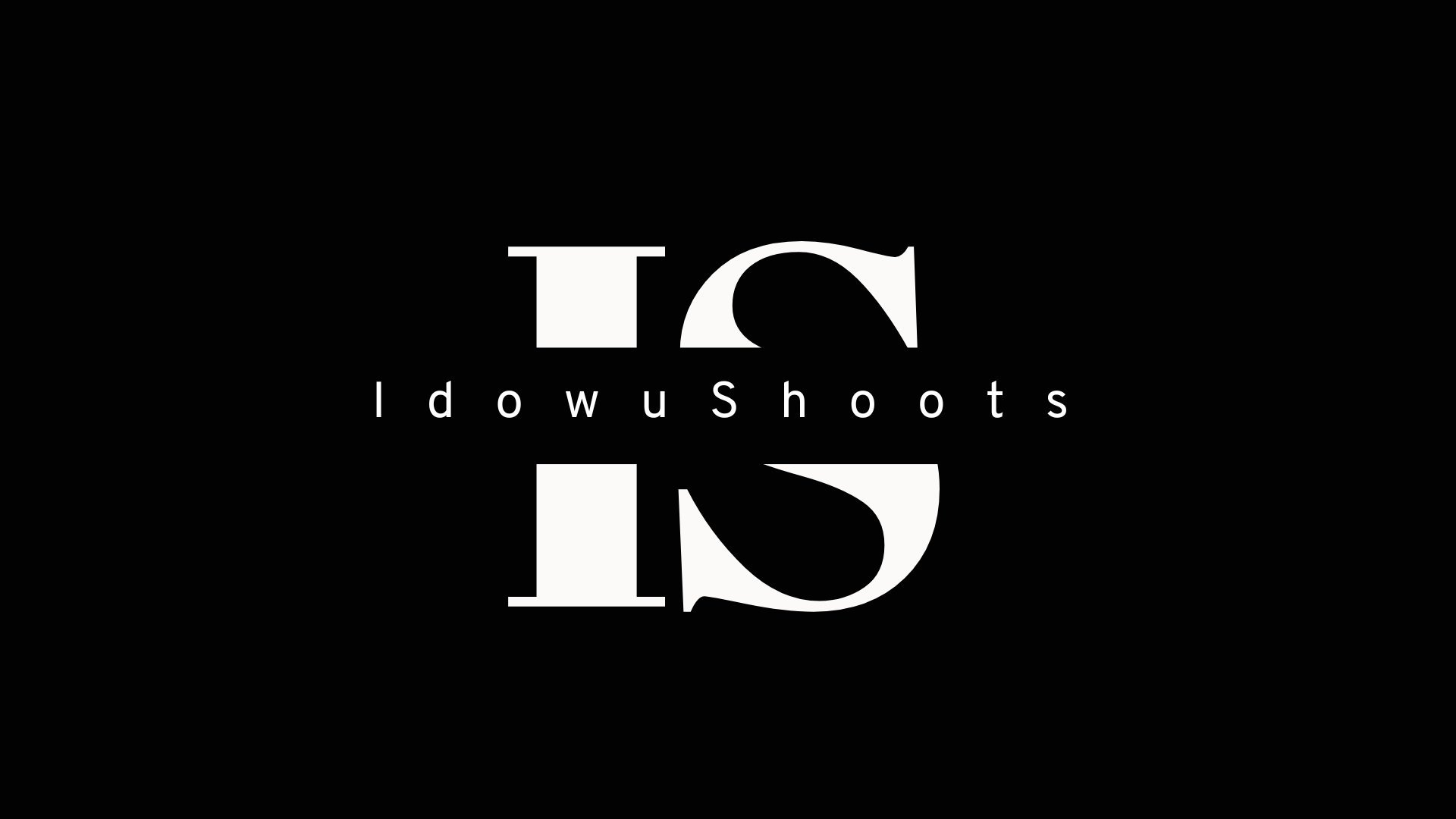 Black background with white text that says 'IdowuShoots' in the center, with large, stylized 'IS' letters behind it.